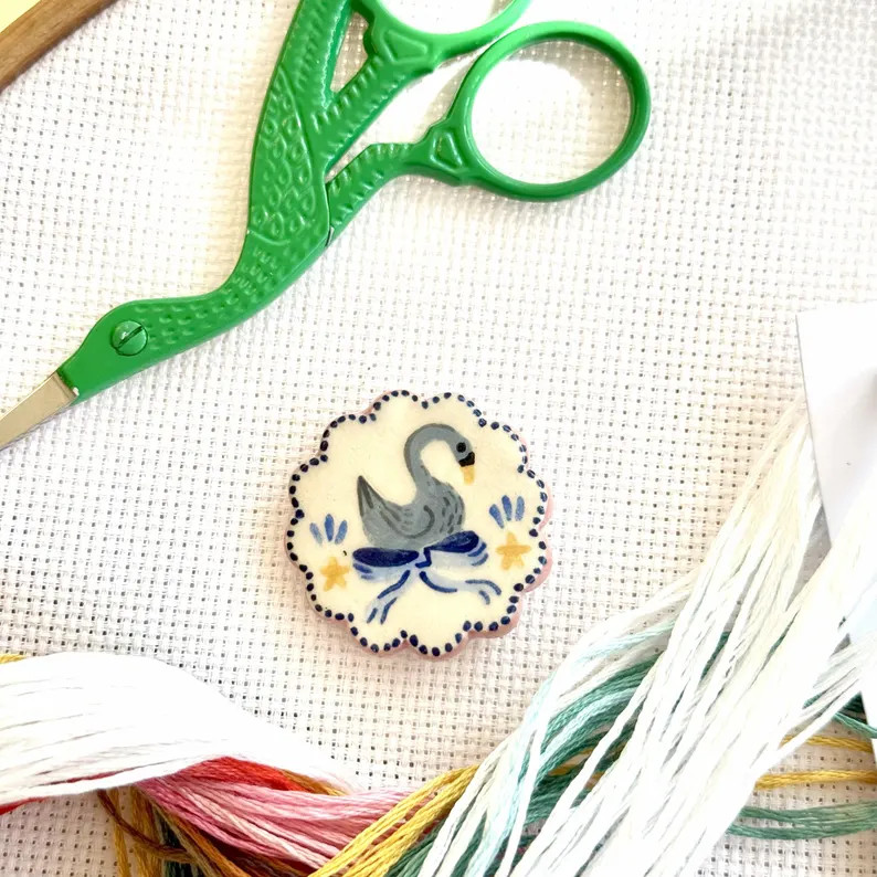 A gorgeous ceramic needle minder.  These ceramic shapes are handmade in the UK by the very talen... | Etsy (US)