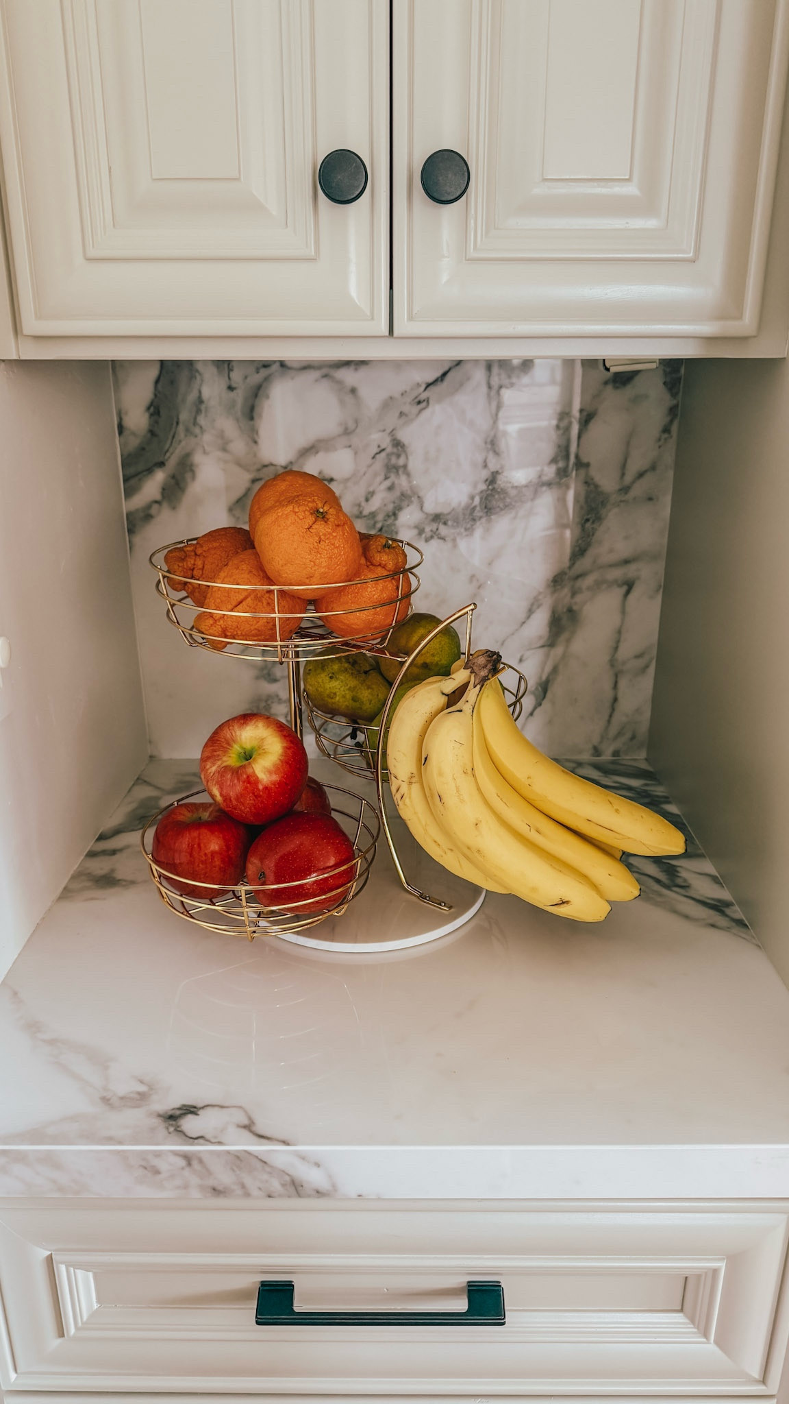 This hanging fruit basket save so much countertop space and is one of my favorite kitchen organizers!

#LTKHome