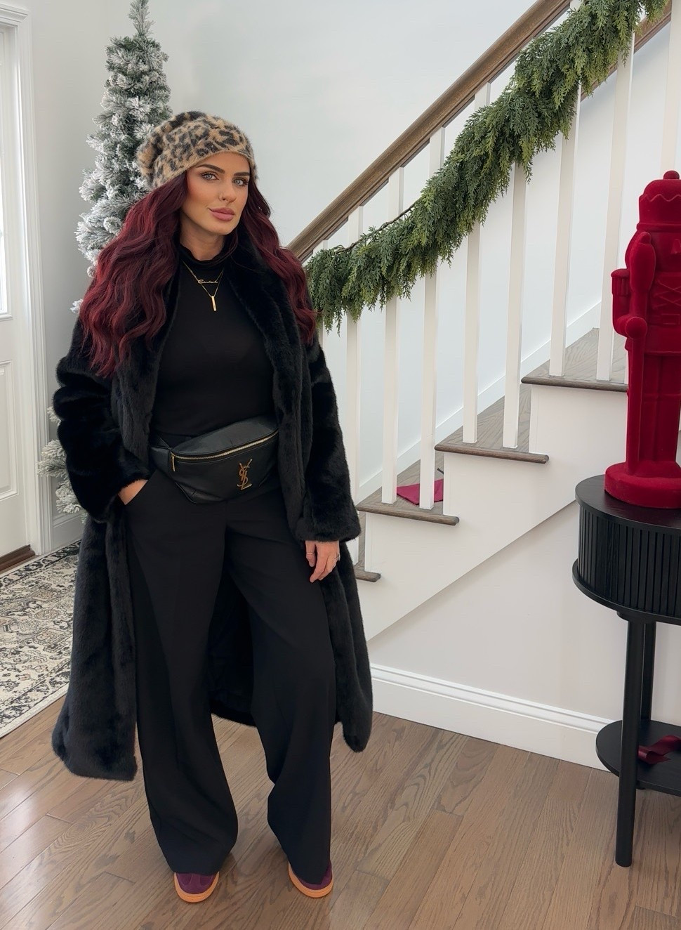 Wearing a 0 in the pants (express), small in the turtleneck, and a XS in the fur coat. 