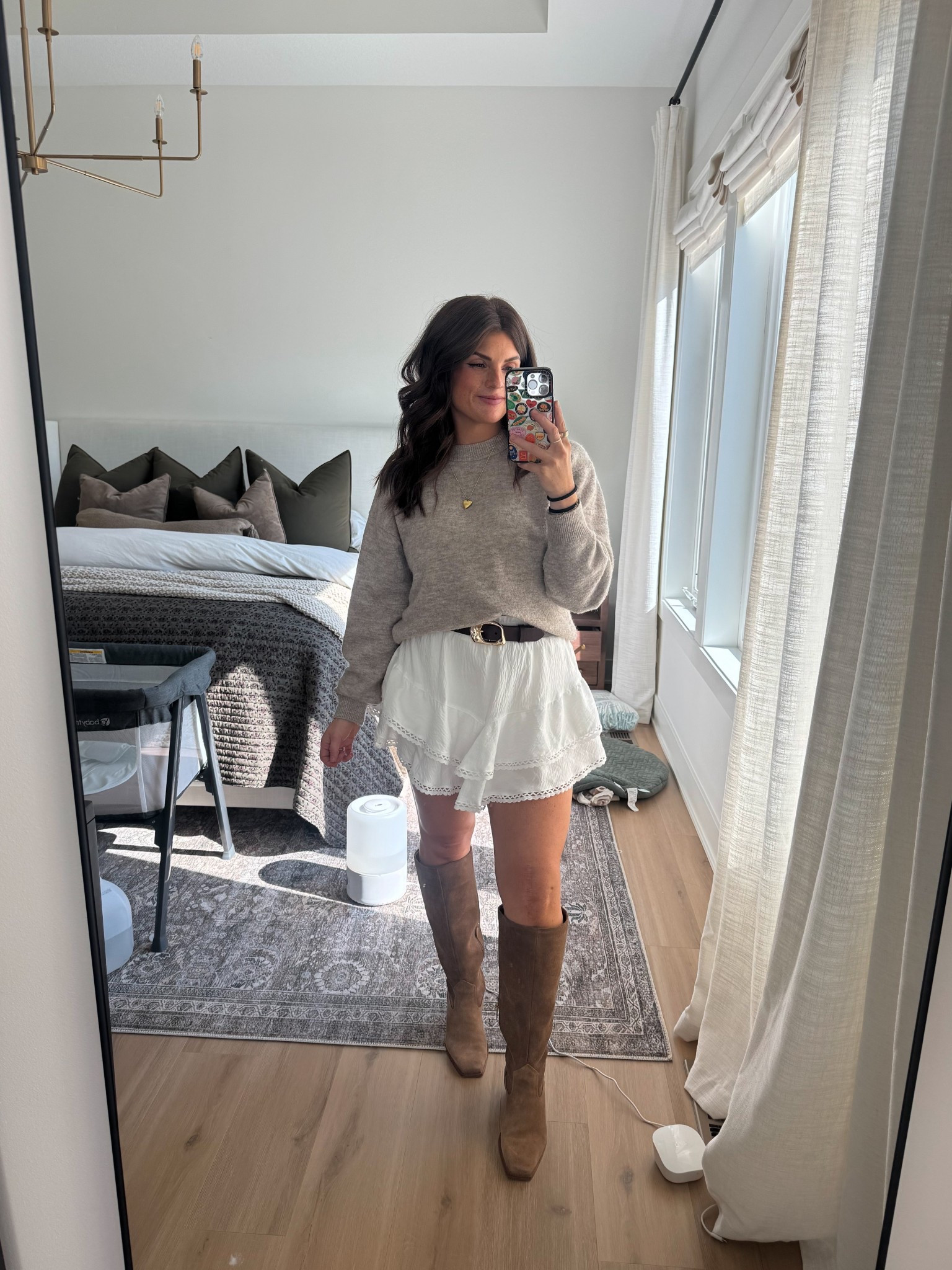 Love this little Amazon skirt (especially postpartum!!) wearing a small! 
Tall boots outfit, white skirt outfit, fall date night outfit

#LTKShoeCrush #LTKStyleTip #LTKFindsUnder50
