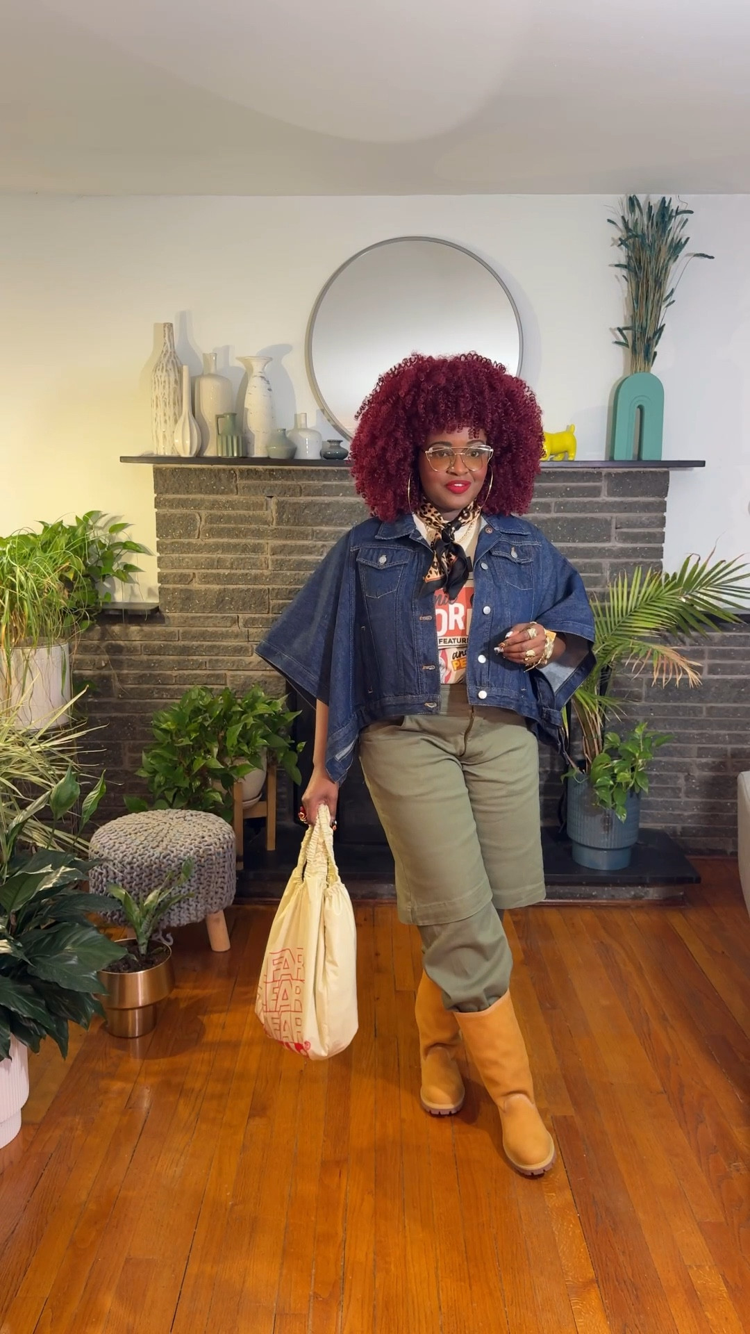 I finally found the perfect moment to style this Sinner t-shirt by @kashmirviii (linked similar style). I love the movie, so I just had to have it! To keep it simple, I knew this shirt would pair perfectly with my Telfar x Timberland boots. I threw on some double-layer khaki pants I snagged from Shein, along with a dark denim poncho I picked up from  Anthropologie . I decided to complete the look with my stack of jewelry and my Telfar plastic bag!

#LTKMidsize #LTKStyleTip