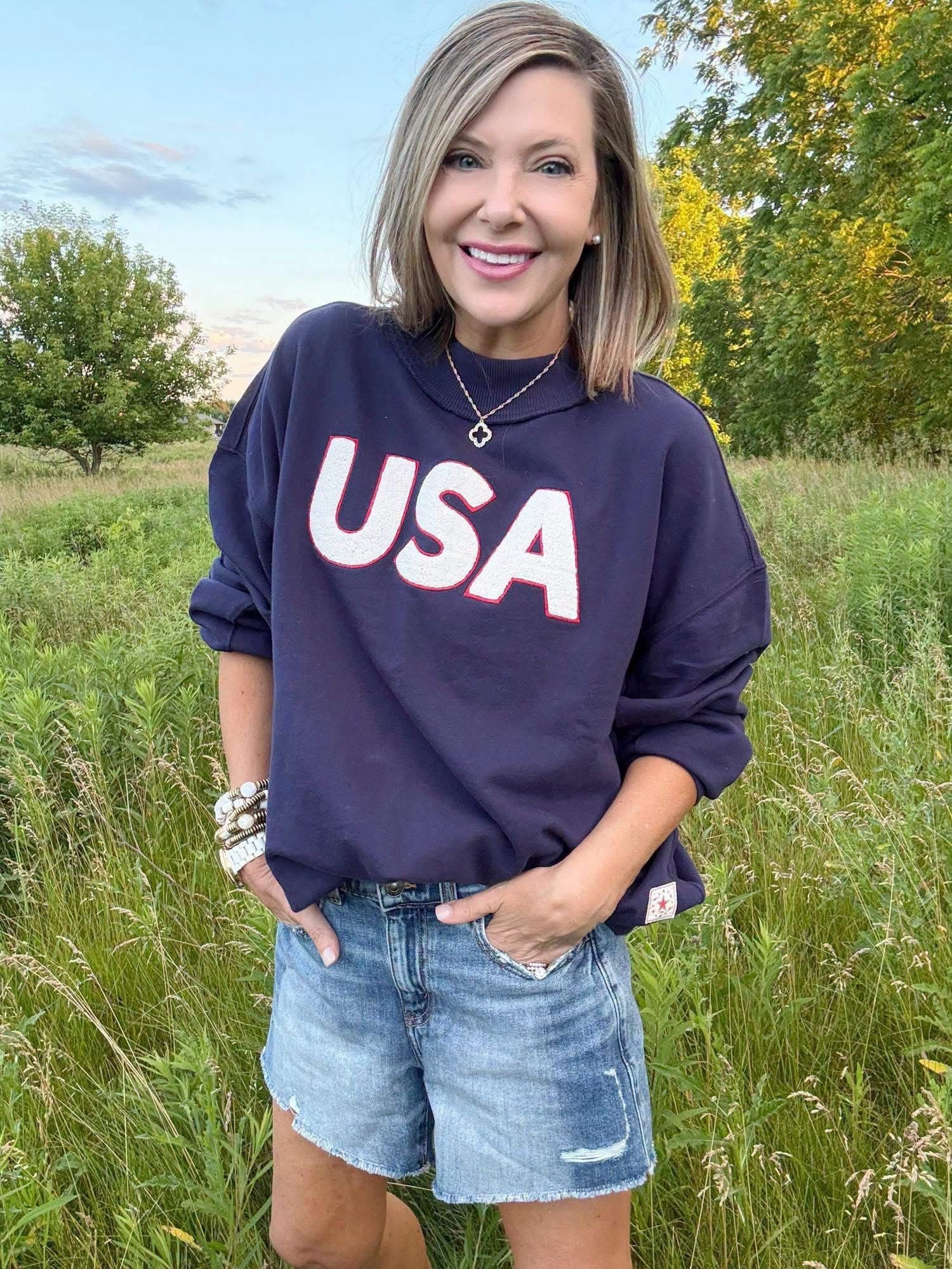 My cute sweatshirt is down to 50% OFF today but it’s selling fast! ￼ I’m wearing ￼an XS for reference and it’s still big! Size down 1! Shorts also on sale! 🇺🇸

#LTKootd #LTKSaleAlert #LTKSeasonal
