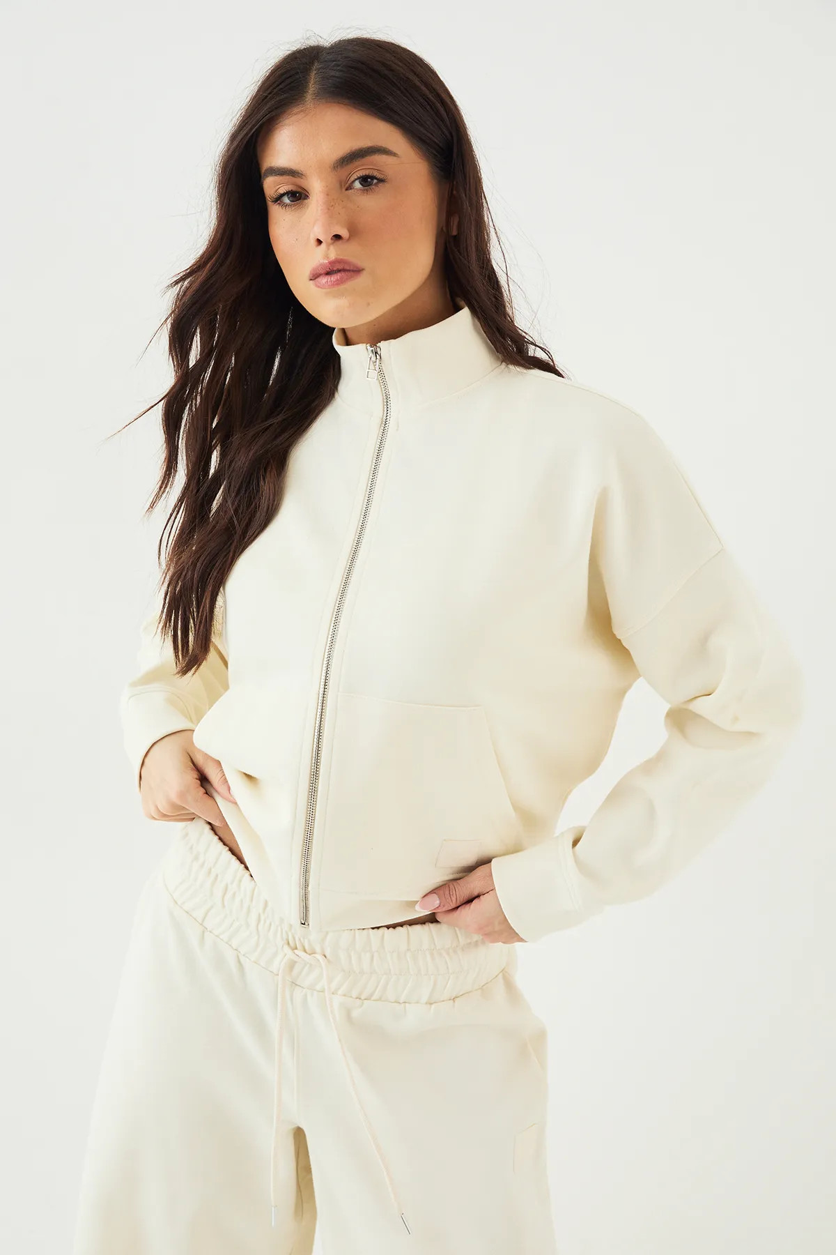 Cream DSGN Studio Interlock Funnel Neck Zip Through Bomber | PrettyLittleThing | PrettyLittleThing UK