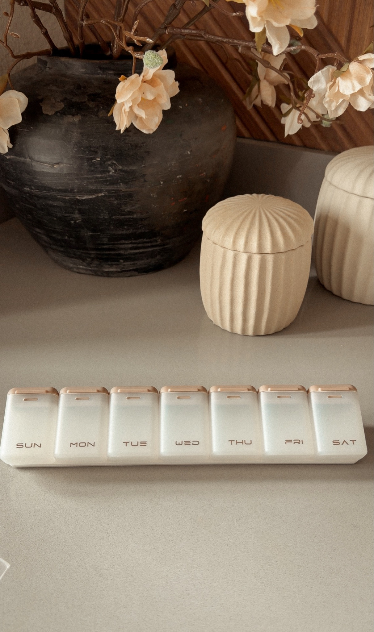 This aesthetic weekly pill organizer has been one of my favorite little finds. It’s simple, clean, and actually makes it easier to stay consistent with daily vitamins and supplements. Available on Amazon, super affordable and has been a real game changer in terms of my health goals this year!  

 #LTKmomlife #LTKmorningroutine #LTKselfcare