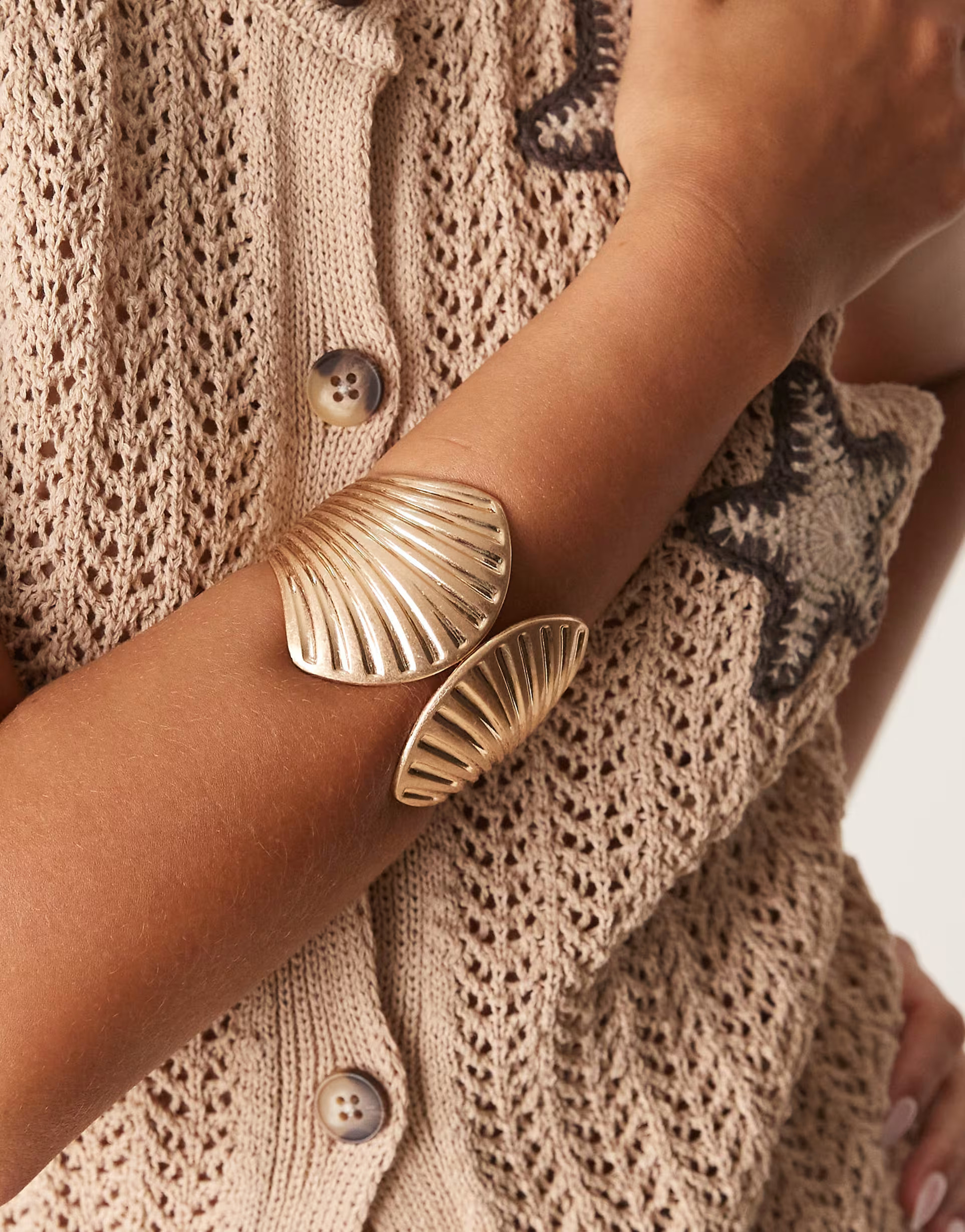 ASOS DESIGN large cuff bracelet with shell design in brushed gold tone | ASOS (Global)