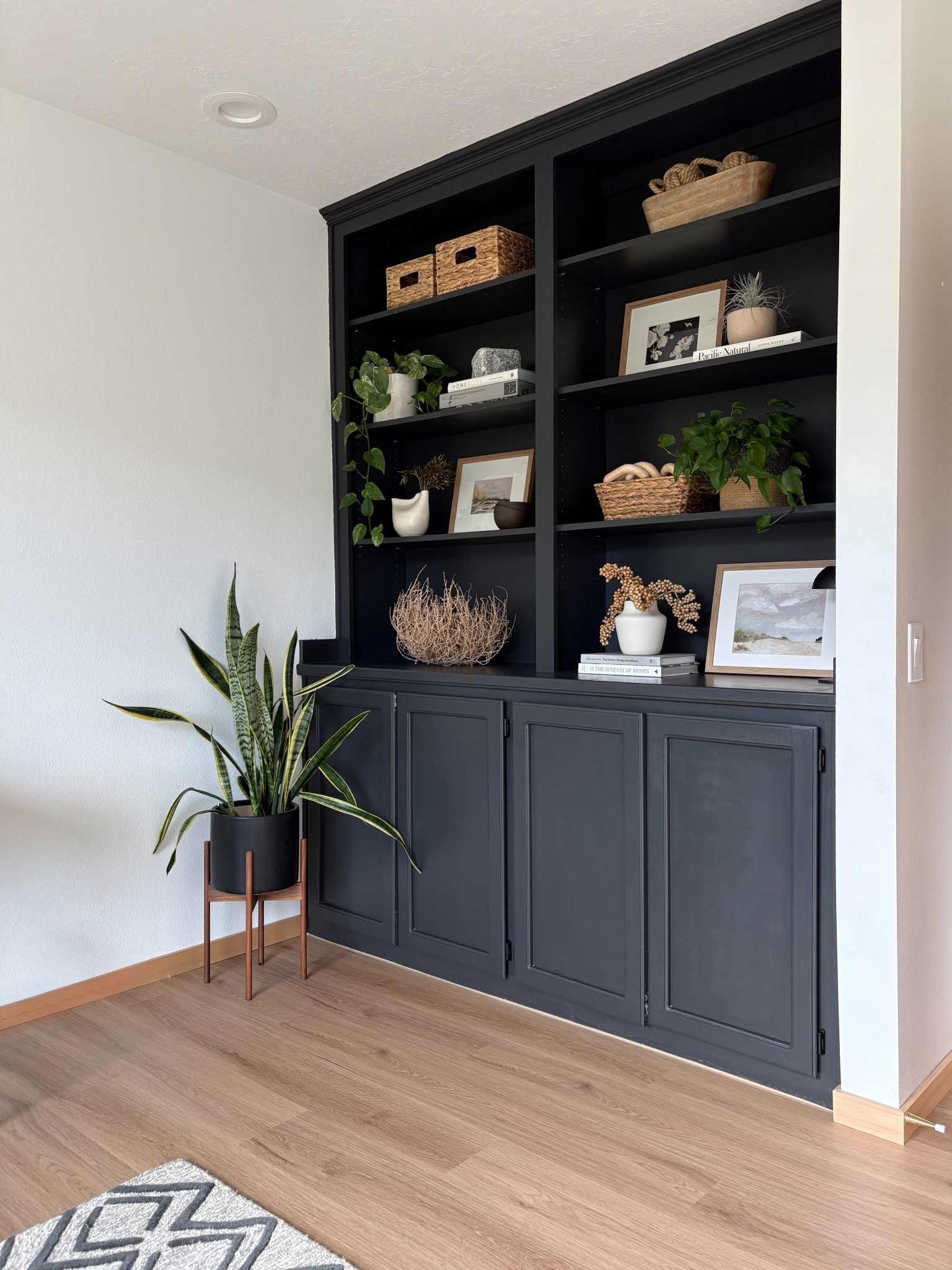 Finally getting the bookshelves back together after this room renovation. New LVP flooring and windows took over for a while. Things feel right again with my natural neutral decor pieces, including dried greenery, plants books, artwork, and baskets. Painting this bookshelf is one of the best things I did this year! 

Read more about my floors here: 

https://www.allisajacobs.com/coretec-flooring-review-calypso-and-springfield-oak/

#LTKHome