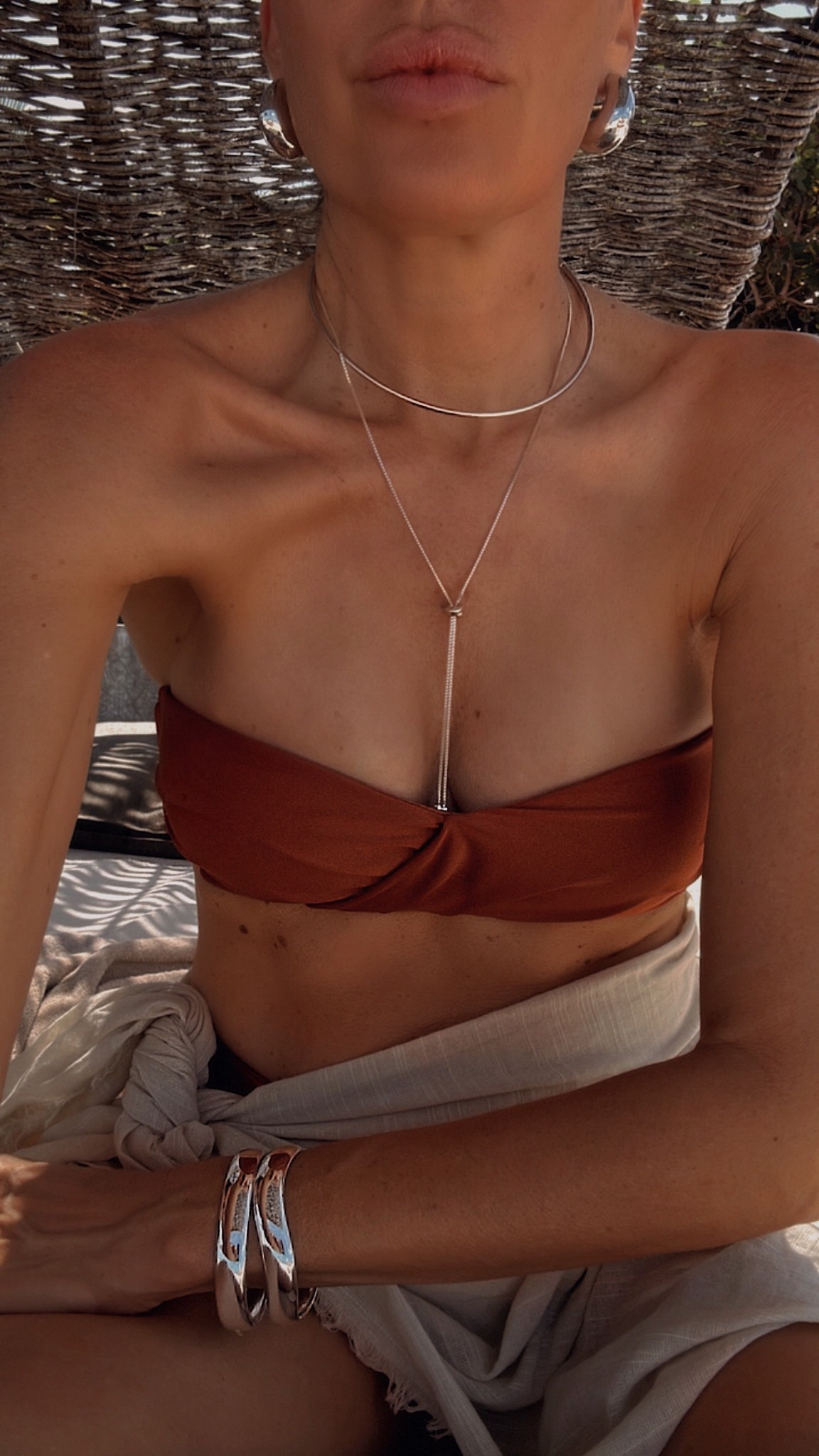 Love this copper color swim mixed with silver jewelry. Fits tts to slightly large for swim.  I’m wearing size P  

#LTKTravel #LTKSwim #LTKFestival