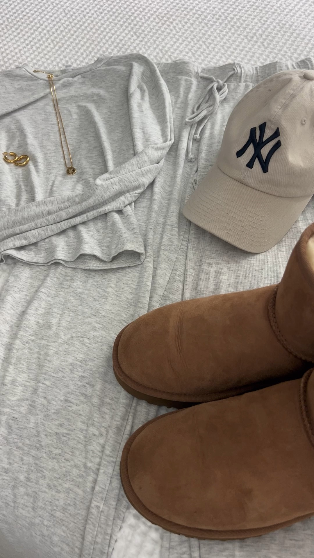 Living in soft sets and cozy UGGs lately ❤️this look is giving all the lounge day vibes with a touch of gold and a hat to top it off because we all know today isn’t wash day 💆🏼‍♀️🚿 #LoungewearLooks #CozyVibesOnly #WeekendWear #MatchingSet #LoungeWear

#LTKSeasonal #LTKStyleTip #LTKTravel