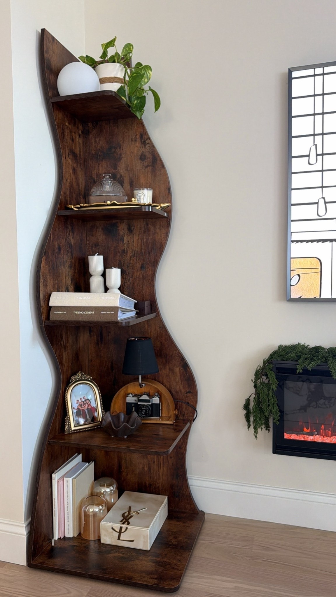 Loving my new accent shelf and how we styled it 🖤✨

#LTKGiftGuide #LTKHome #LTKSeasonal