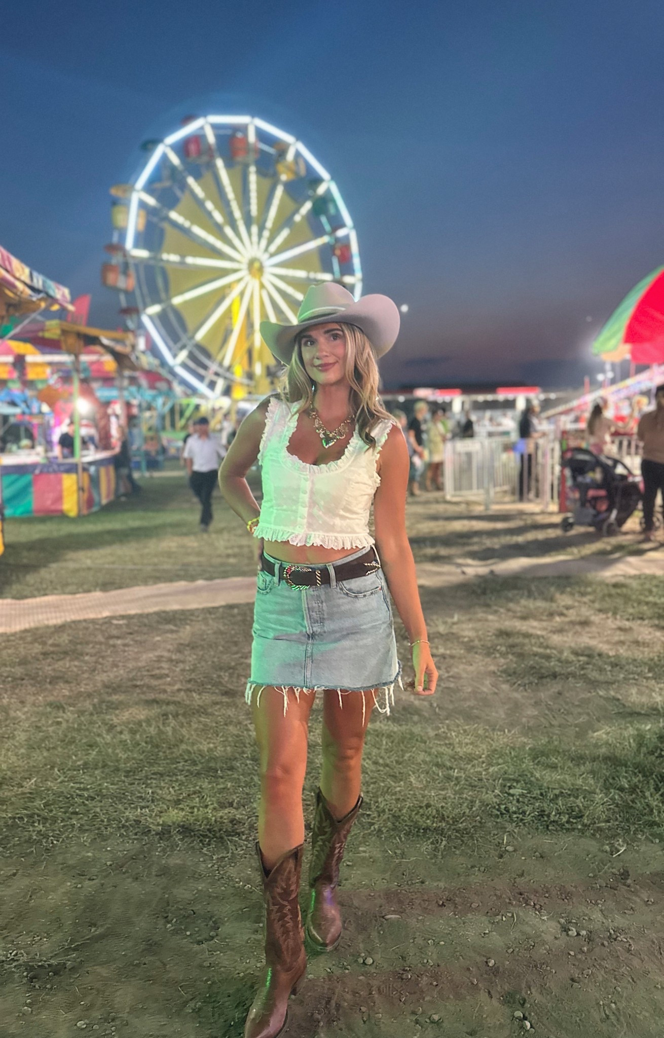 Country concert outfit at the fair🫶🏻
Hat is a custom Stetson and boots are the Idyllwind Wheeler Western boot-snipe toe from Boot Barn. 

White top, denim skirt, cowboy hat, cowboy boots, western wear, western outfit, fair outfit 

#LTKFindsUnder100