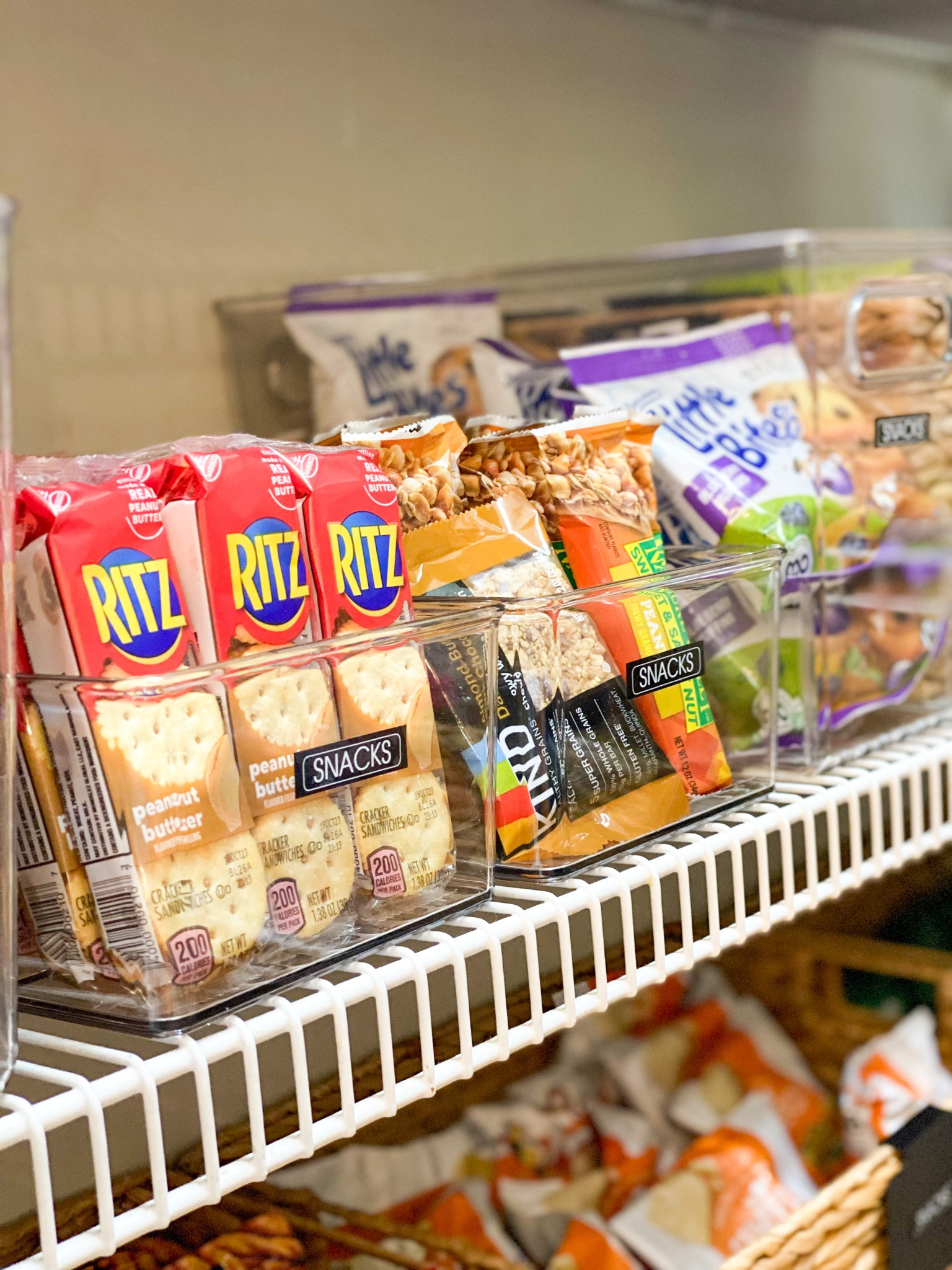 When you're hosting a gathering, its pretty likely that your guest will congregate in the kitchen right?  And odds are that you'll be opening up that pantry door about a dozen times to grab more refreshments. Wouldn't it be awesome if your pantry looked like this?? 

Let's be honest - the pantry is one of the most visible parts of your house and its often the most forgotten. If you're ready to upgrade your pantry, you know we'd love to help. PANTRIES ARE OUR FAVORITES. 

Featured in this post is another one of our favorites - clear mDesign bins. 

Go ahead, show off those granola bars. 