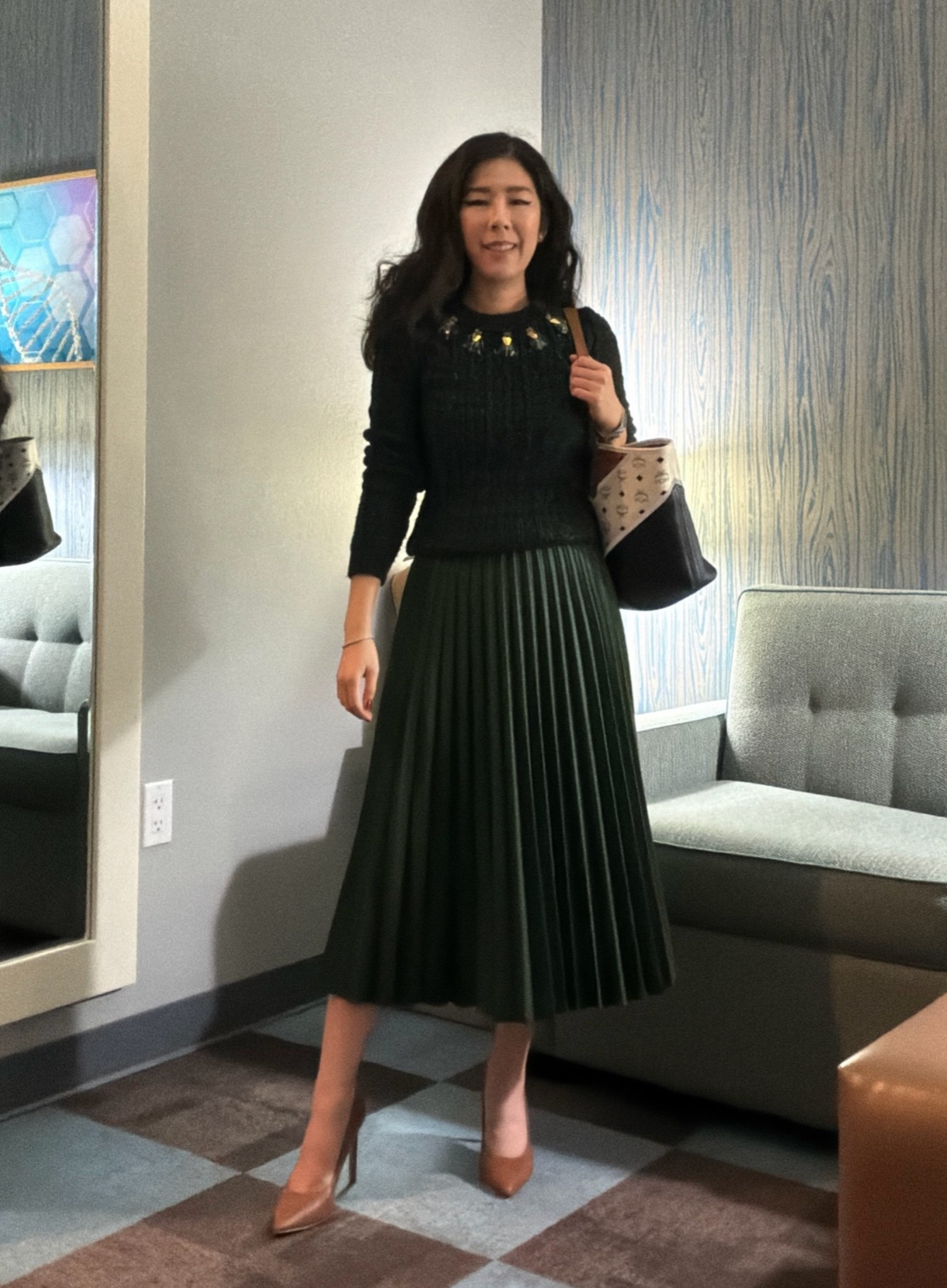 Monochromatic green for today’s work outfit! Even though it’s warm in SoCal, it’s always windy and chilly in South San Francisco. There’s something about creating an outfit in one color palette that exudes old money sophistication. I paired this chunky Tory Burch cableknit bug sweater with my high waisted leather pleated midi skirt. To add a pop of color, I wore my caramel colored pointy heels and tri-color chevron MCM tote! 

#monochromatic #cableknitsweater #pleatedskirt #corporatestyle #winterstyle

#LTKWorkwear #LTKPetite #LTKootd