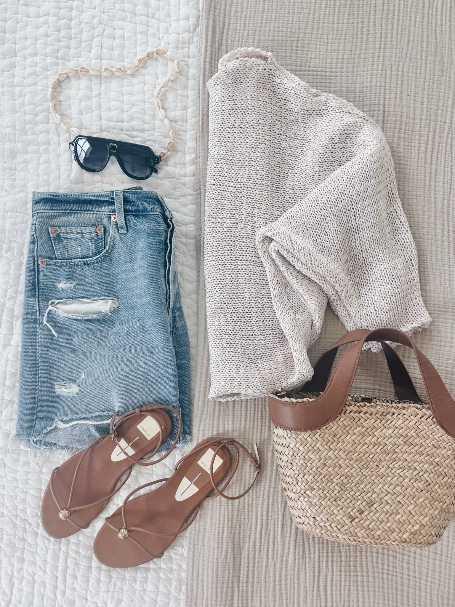 Mixed weather summer outfit. Size up one in the waist of the shorts.  I have small in the sweater.  Sandals true to size.  Vacation outfit. The shorts are mid thigh length 👌🏼.

#LTKootd #LTKOver40 #LTKgrwm