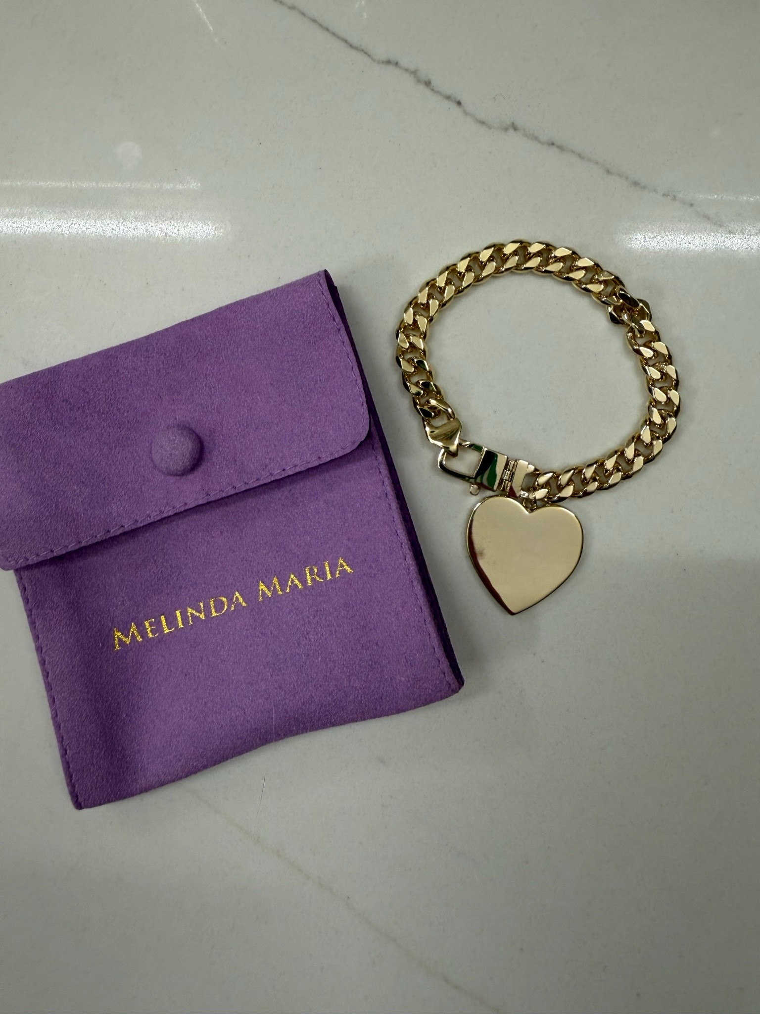 Gorgeous gold heart pendant bracelet