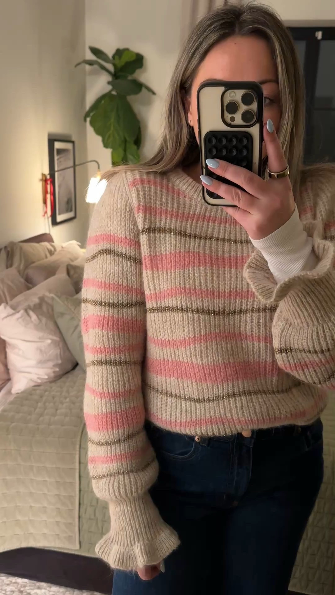I love adding a little pop of color this time of year, like the pink stripes on this sweater. How cute is the micro puff at the shoulder and the ruffled sleeves?! 

My sweater is on sale for under $200, and I’m also linking my ($10!) undershirt that prevents any itching. (Very sensitive to alpaca!) 

These wide leg jeans are a new find and I’m OBSESSED! So affordable, too. Only $50! Perfect for winter capsule wardrobes and will transition to spring very well. 

#LTKootd #LTKFindsUnder50 #LTKSeasonal