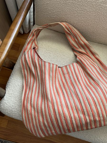 Striped carryall bag in a slouchy woven straw fabric. Carries so much! 

#LTKfindsunder100 #LTKitbag #LTKSeasonal