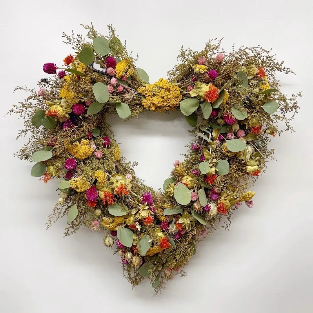 A romantic wreath that feels both wild and timeless 💕 The Blossom Heart Wreath is handcrafted in a heart shape using airy sweet annie and silver dollar eucalyptus, layered with sunny yarrow, vibrant globe amaranth, warm safflower, and touches of nigella. The mix of textures and soft colors creates a natural, love-filled statement piece that’s perfect for gifting or adding a bit of romance to your home décor. Grown, harvested, dried, and handcrafted on a U.S. farm, each wreath is beautifully one of a kind.

#ltkhome #driedflowers #romanticdecor #wreathdecor #farmhousestyle #cottagecore #naturaldriedflowers #giftideas #homedecorinspo #ltkfinds

#LTKSpringSale #LTKHome #LTKSeasonal