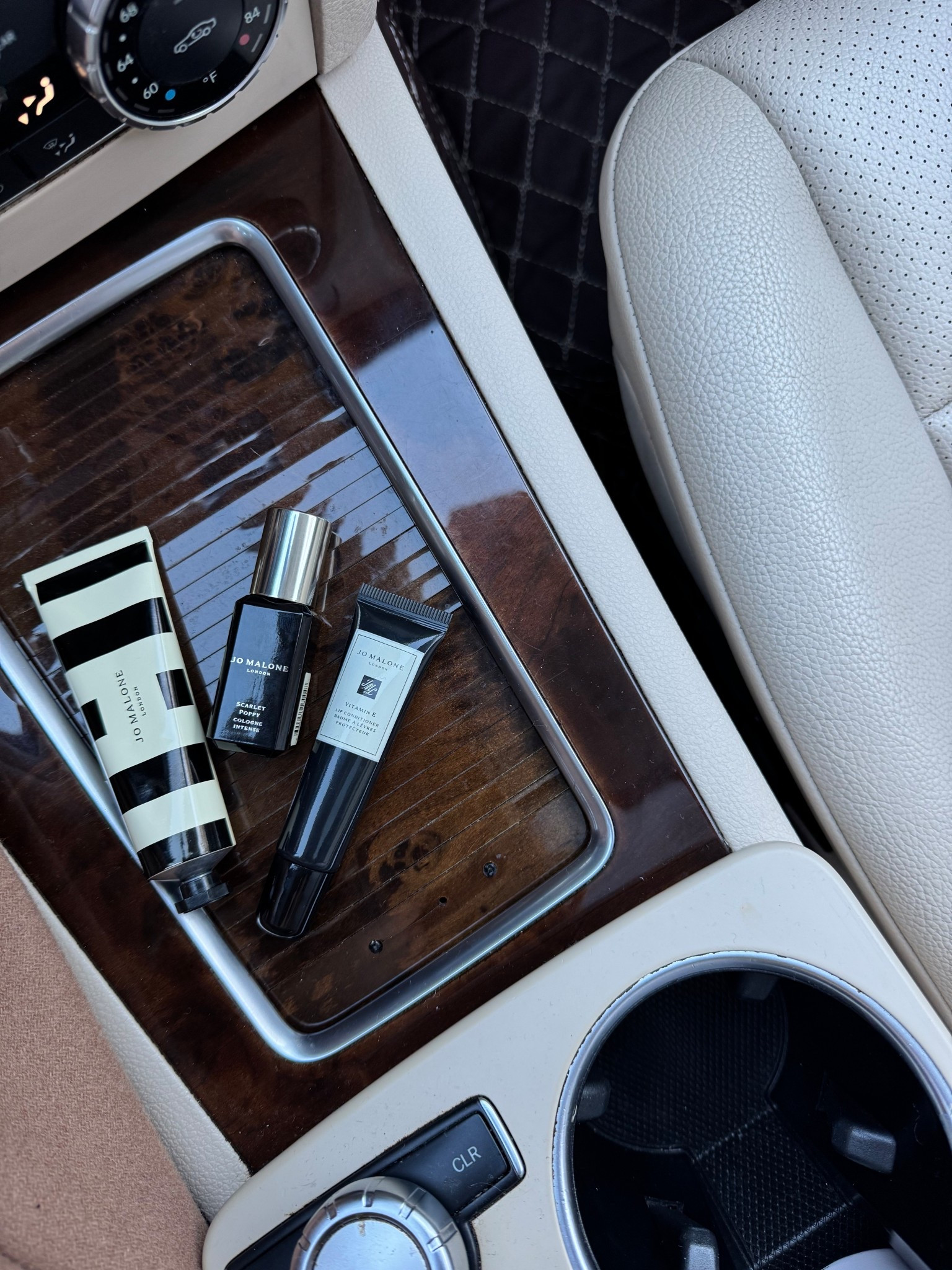 Chic yet practical car essentials: cologne/perfume, lip balm, and hand lotion 

#LTKFindsUnder50