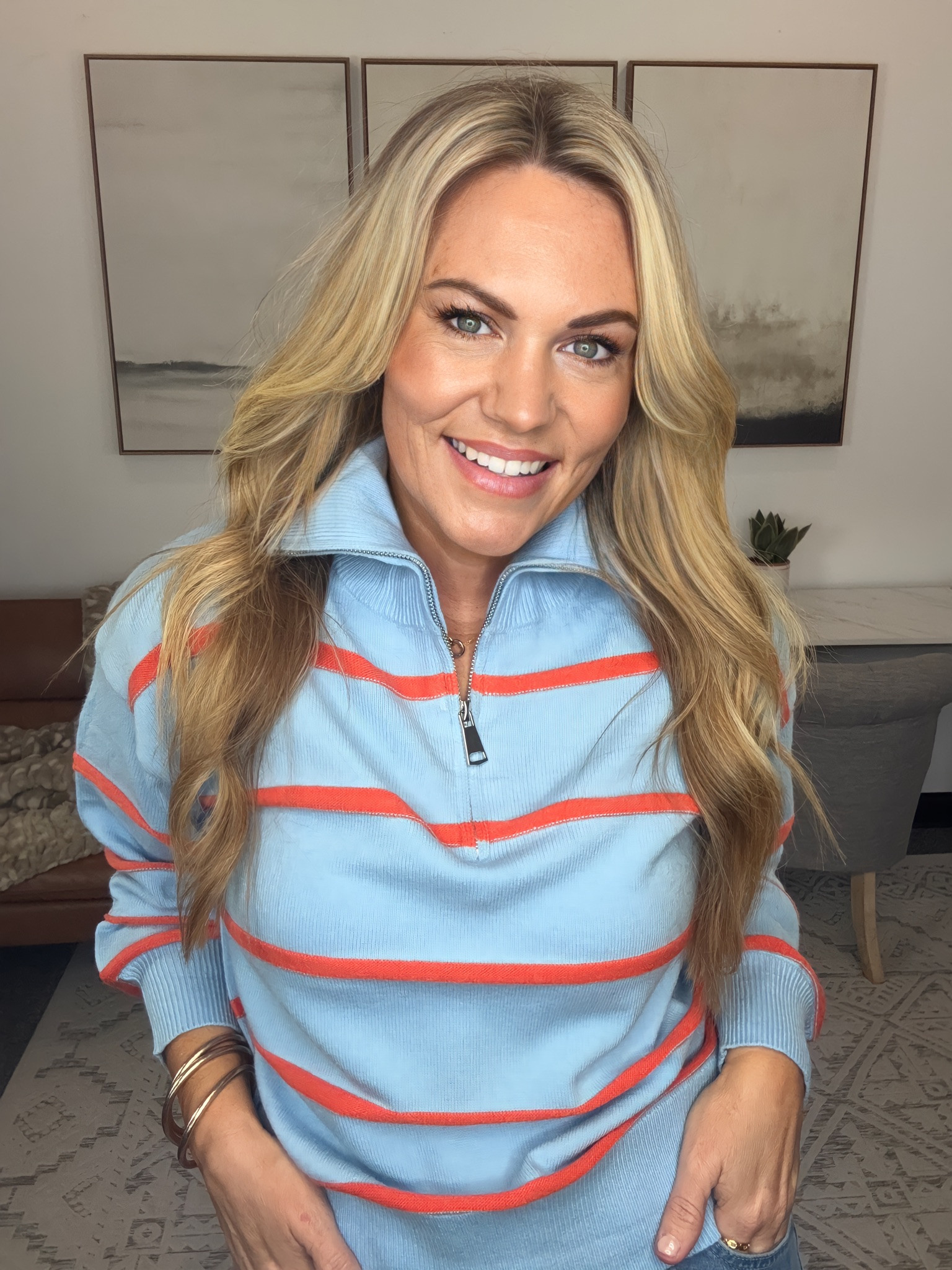 The color combo sold me on this one. The soft blue with the coral stripe makes a classic quarter zip feel a little more interesting, and it’s an easy layer to throw on with denim as the weather starts to cool down.

striped quarter zip, blue pullover, women’s sweater, casual fall outfit, transitional fashion, early fall outfit, denim outfit, weekend style, women’s fall tops, casual layers, AudrieDollins

#LTKSeasonal #LTKootd #LTKdayinmylife