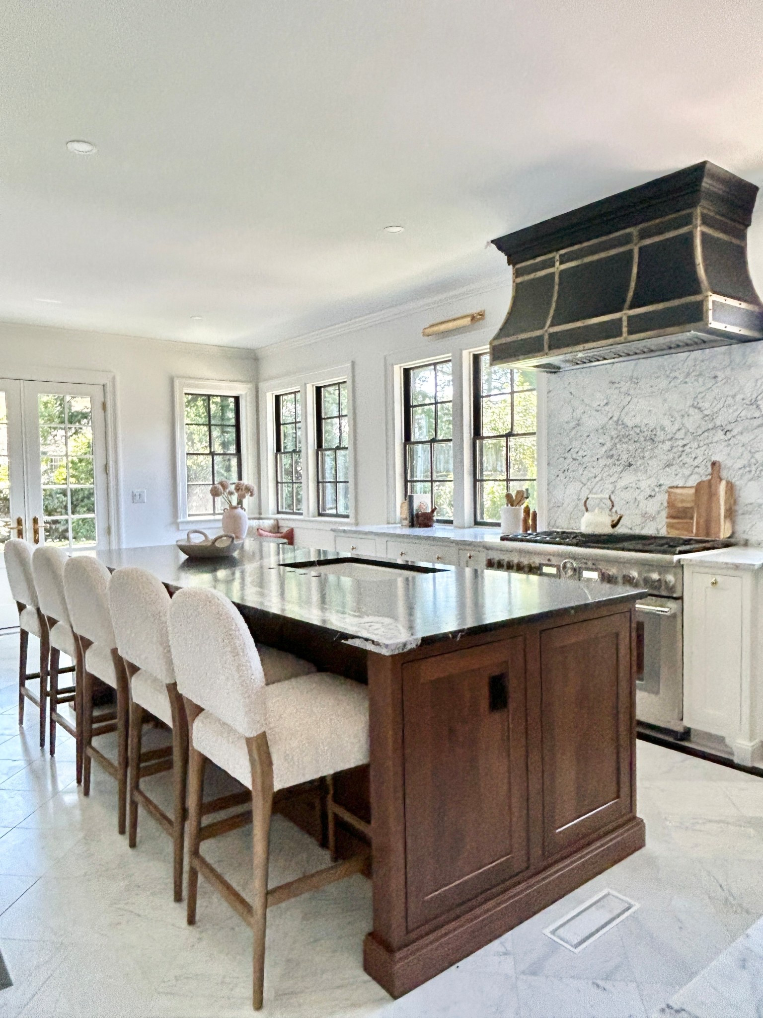 Rounded boucle and wood counter stools. 

#counterstools

#LTKHome