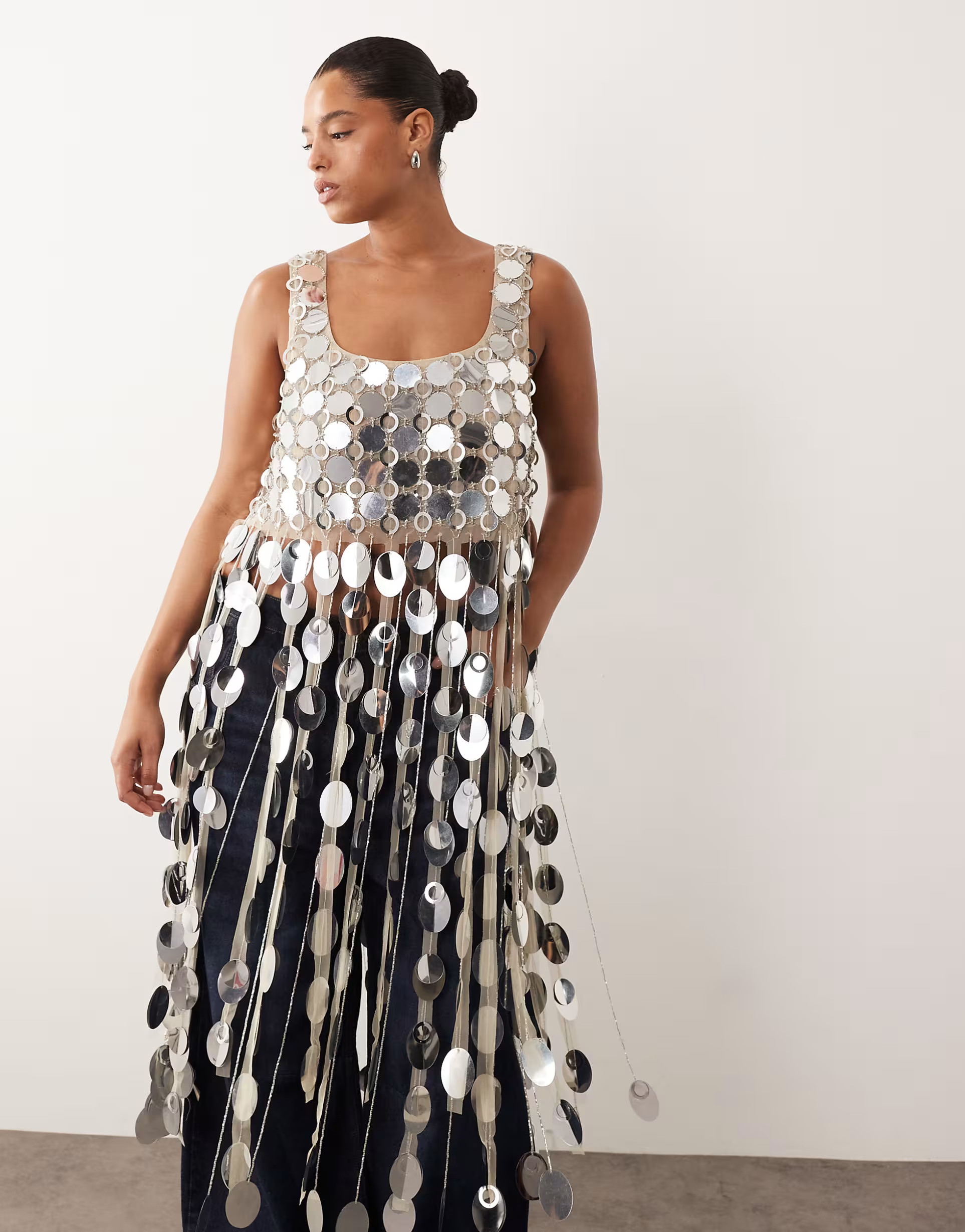 ARRANGE Curve futurist sequin crop top with long 3D fringe hem in silver | ASOS (Global)