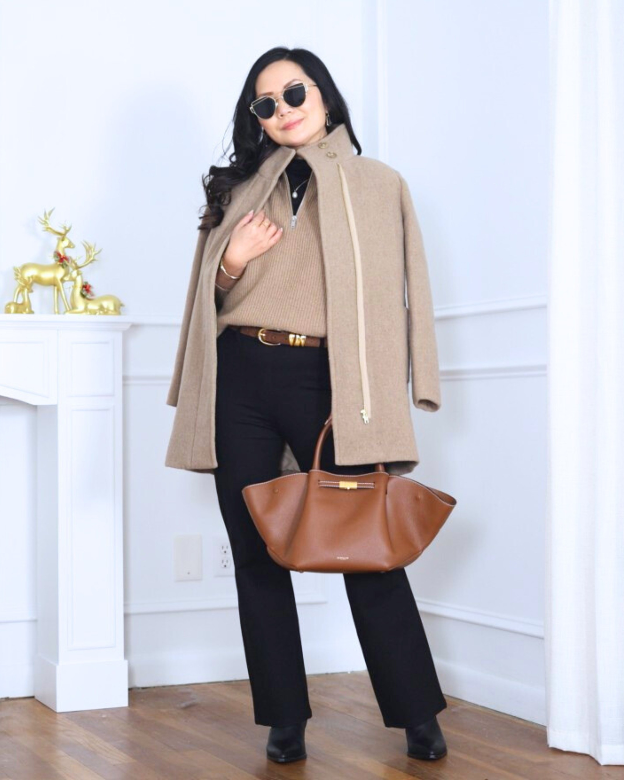 Classic, clean, and easy — a petite city coat from J.Crew Factory layered over a quarter-zip sweater and bootcut pants from Quince, finished with Dolce Vita booties. One of those outfits that feels comfortable but still looks effortlessly polished. I’m 5’2, wearing size XS.

#LTKootd #LTKOver40 #LTKPetite