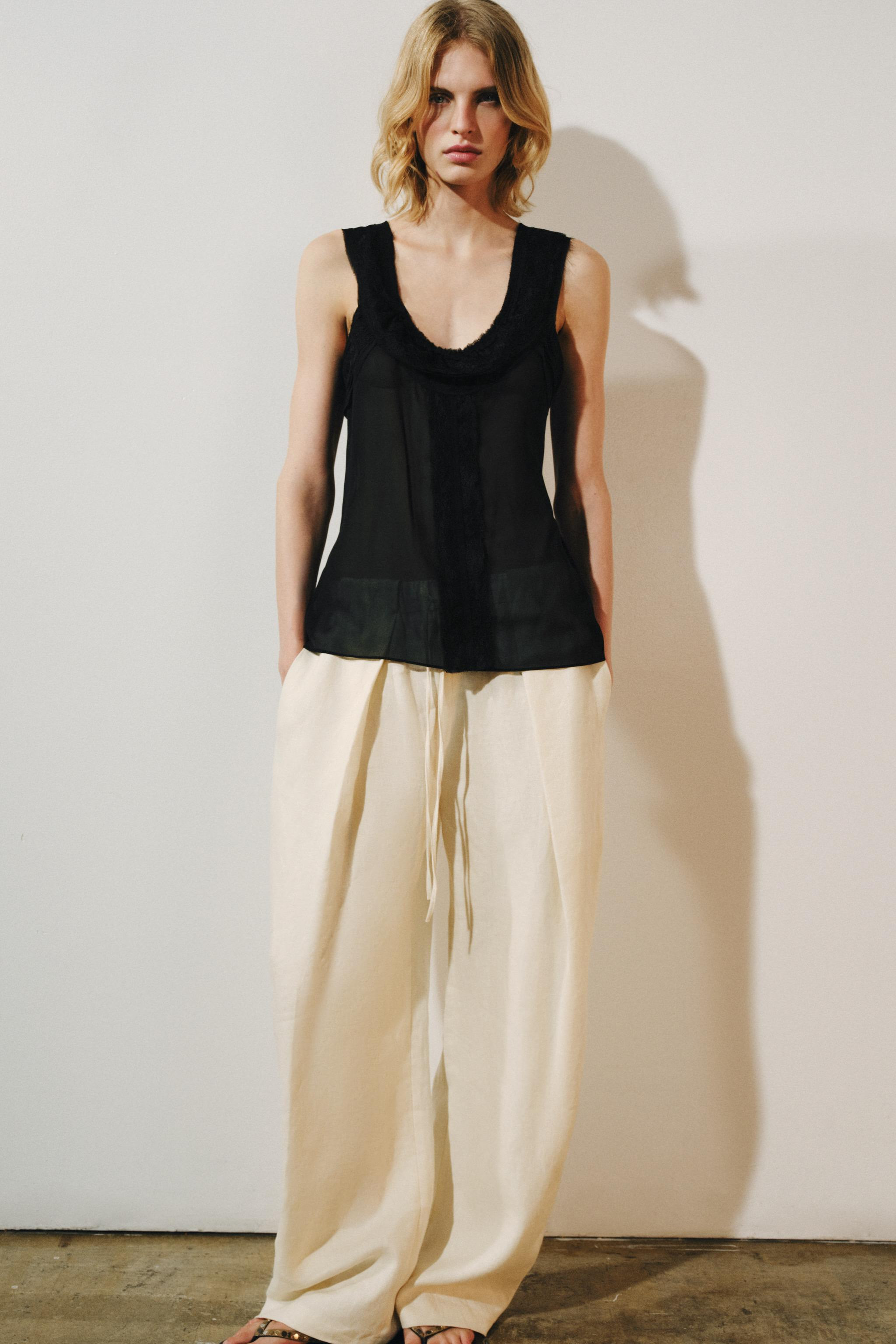 ZARA WOMAN COLLECTIONTop with a round neckline and sleeveless design. Featuring tonal lace appliq... | Zara UK