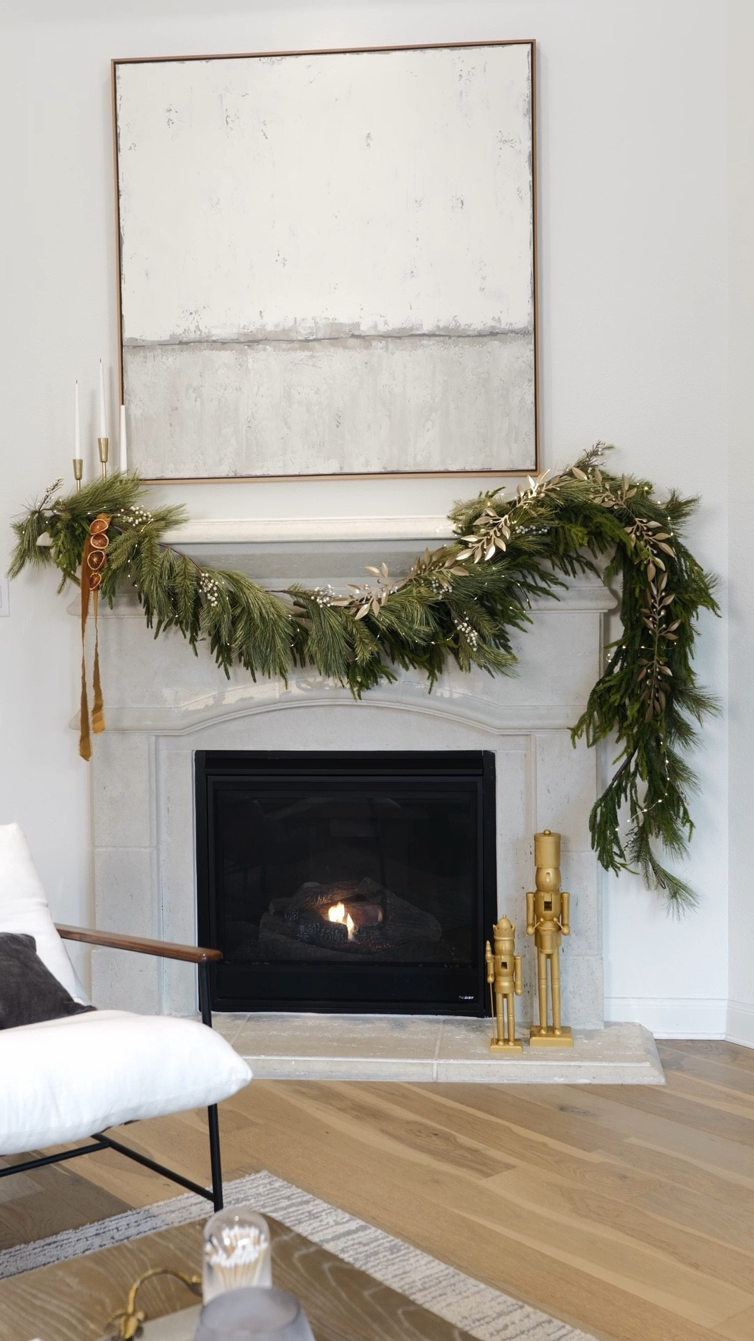THE MANTEL | Layers of garland, metallic, organic, and glow make this Holiday Mantel an elegant centerpiece in the living room. ✨

The shopping list:
Norfolk garland (4)
Pine garland (2)
Metal leaf garland (1)
Velvet ribbon
Homemade orange slices
Candle sticks
Nutcrackers- (I painted these gold)
And of course, fairy lights

#norfolkgarland #hearthandhand #velvetribbon #nutcrackers #garland #fireplacedecor

#LTKSeasonal #LTKhome #LTKHoliday