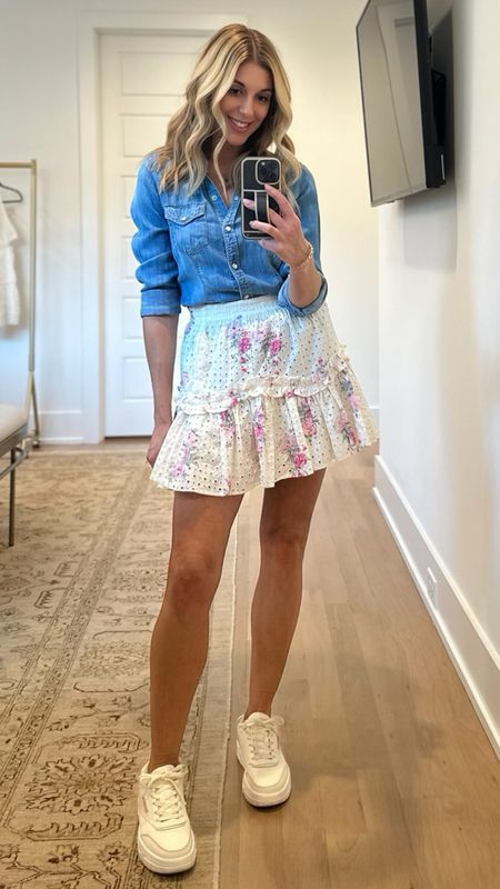 LoveShackFancy Zartti Mini Skirt with a romantic floral printed eyelet cotton fabric. Ruffles gather in the middle and sweep off to a delicate flounce. 
Sale price $79.99
Regular price $325.00