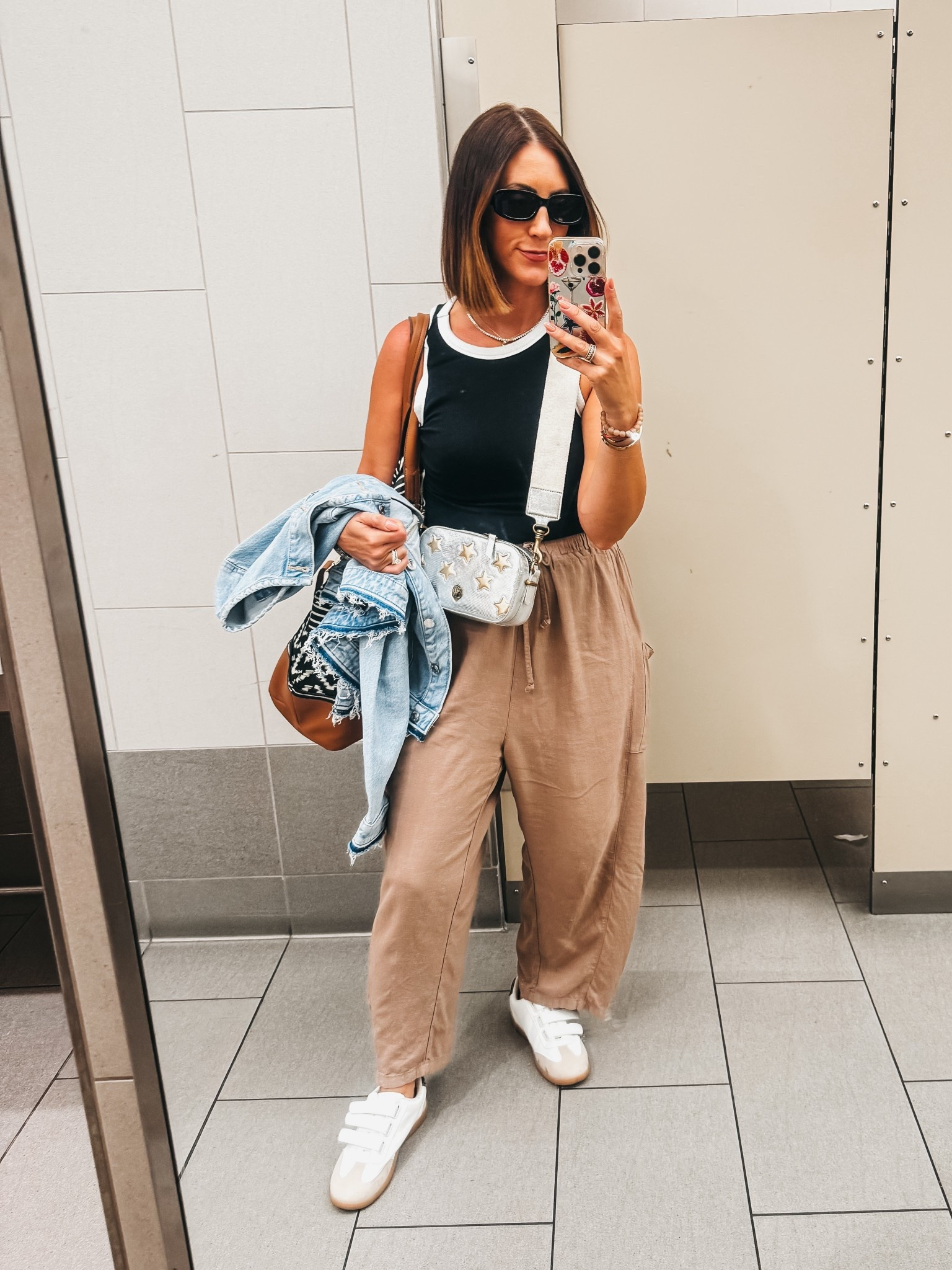 San Diego travel outfit! Wore the pants on the plane and throughout the weekend! 

Flowy linen pants - size small fan 
black tank with white trim - size, small
Collarless denim jacket — size extra small

#LTKFindsUnder50 #LTKOver40 #LTKSaleAlert