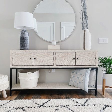 Entryway decor with Ashley’s Furniture console table. One of my favorite pieces in the house. 


#LTKhome