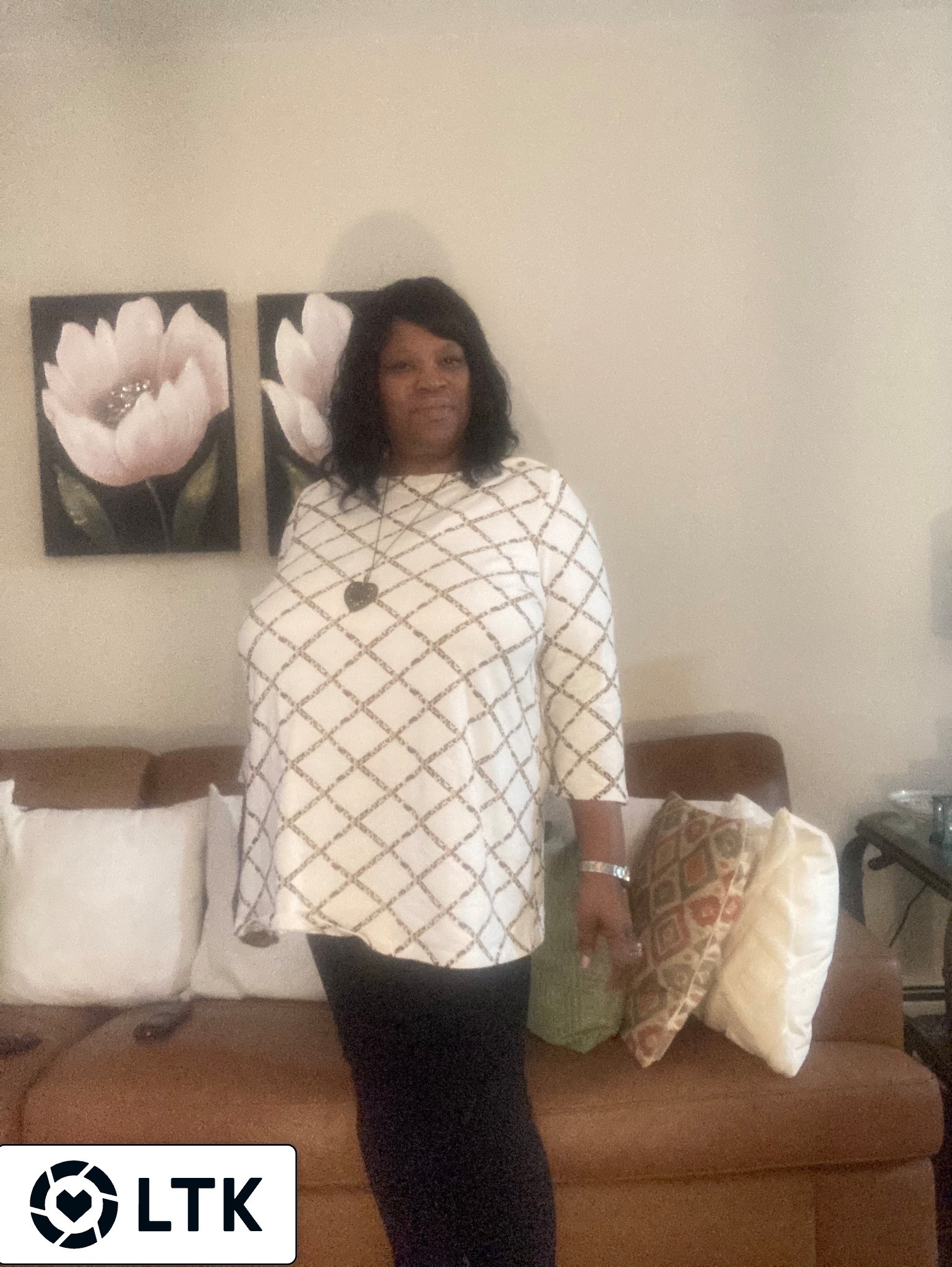 White pattern tunic top with black pants and brown boots.

#LTKPlusSize #LTKOver40 #LTKootd