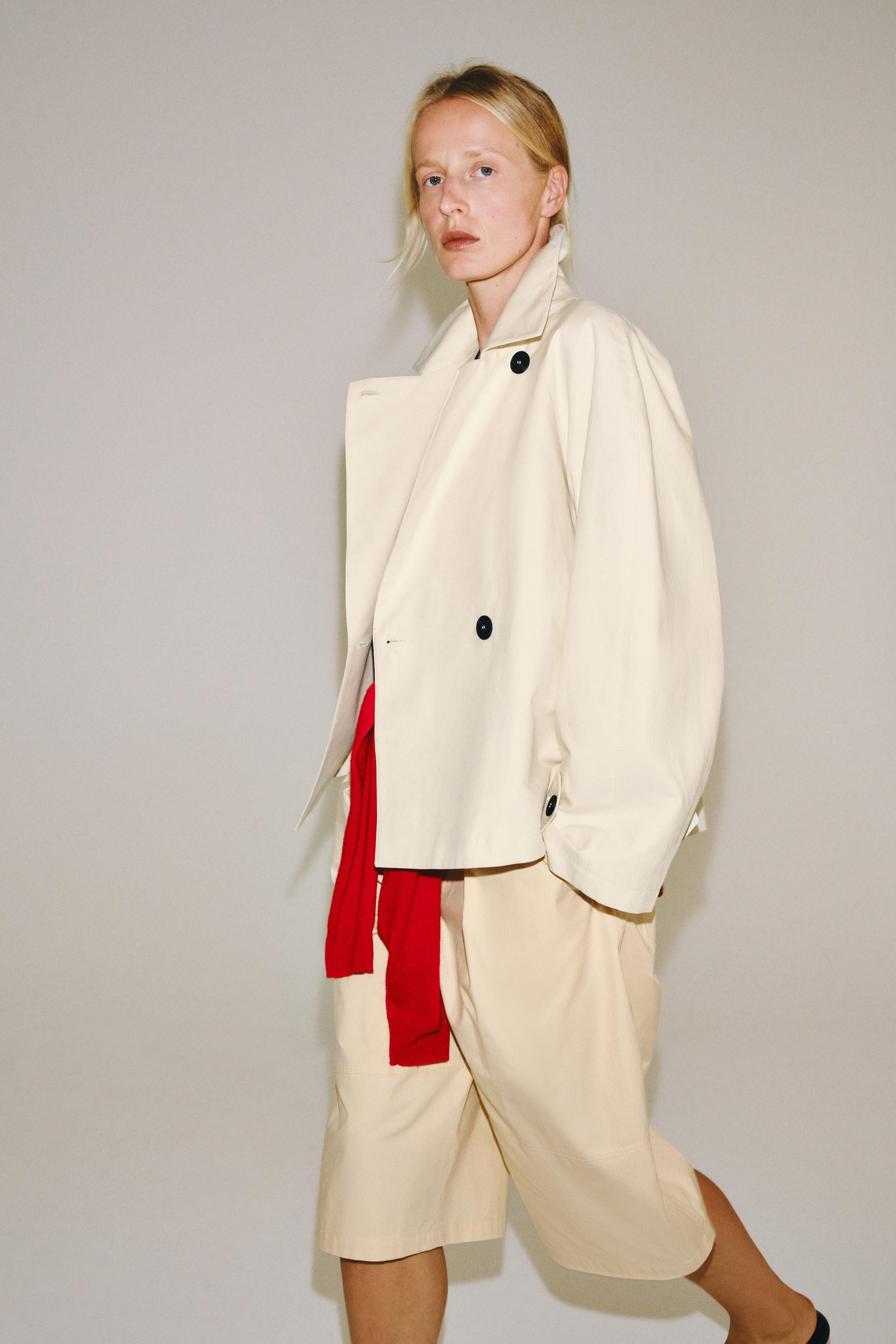 ZARA WOMAN COLLECTIONTrench coat in a cotton fabric. Featuring a high neck and long sleeves. Side... | Zara UK