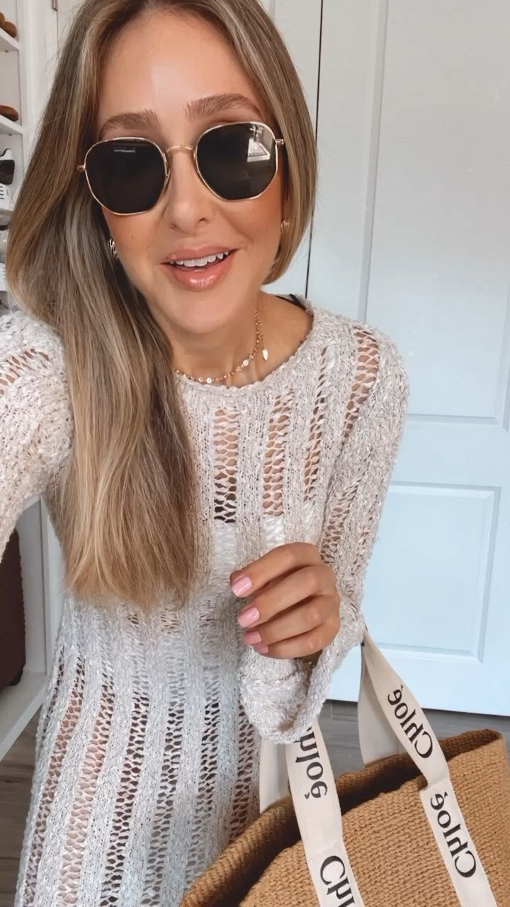 Gorgeous vacation outfit ideas
I am loving these new cover ups. So beautiful, chic, and elegant.
Black beach hat from H&M
Long sleeve cover up
Beach bag
Seashell earrings
Havainas sandals
Marc Jacobs Tote Bag
Rayban Gold & Green

#LTKfindsunder100 #LTKswim #LTKover40