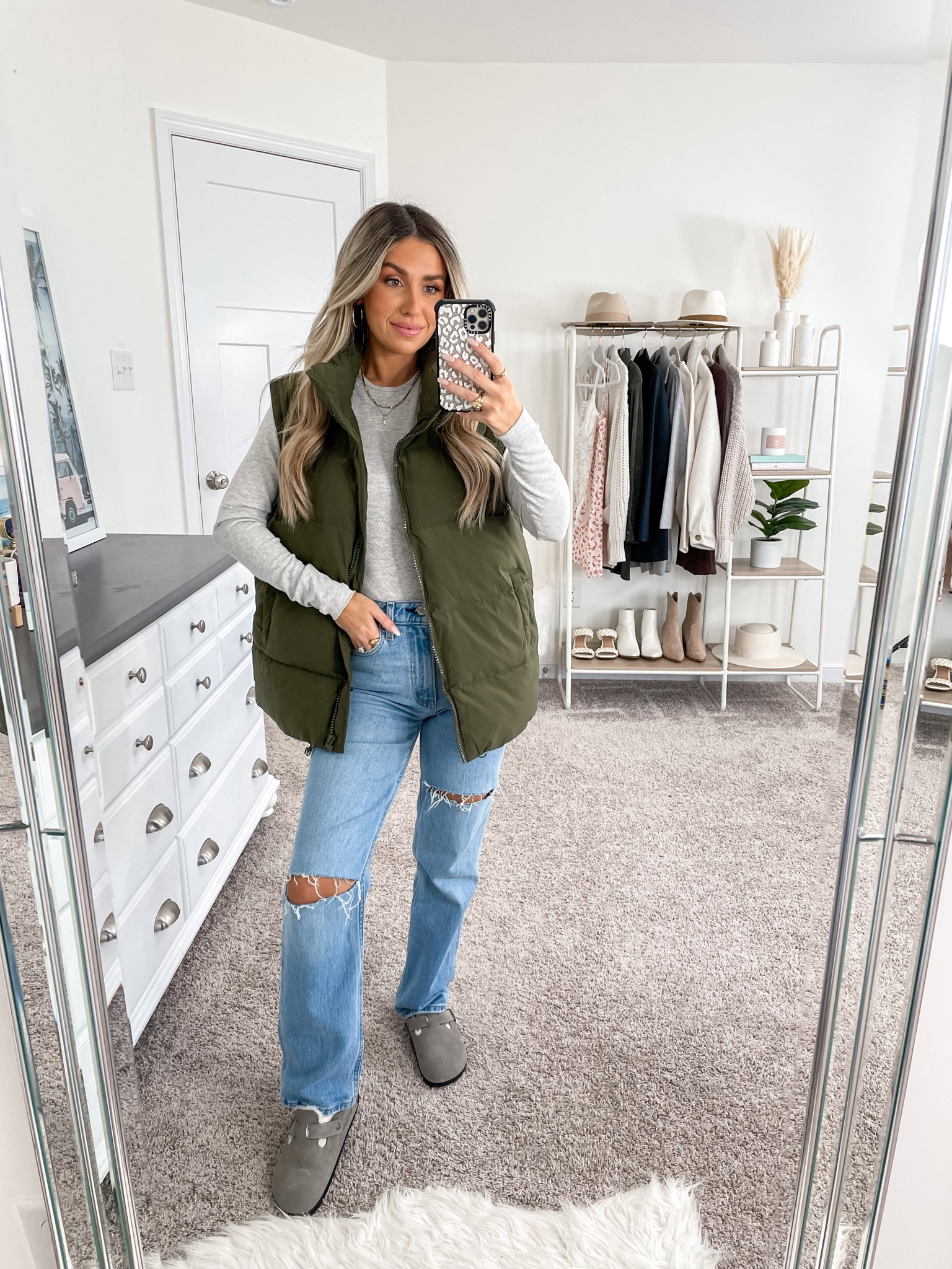 Ten ways to style this green puffer vest from Amazon 🫶🏼 look 7/10 
+ puffer vest: small
+ top: xs
+ jeans: 25 short 
+ Birkenstock clogs: true to size 

#LTKfindsunder50 #LTKfindsunder100 #LTKSeasonal