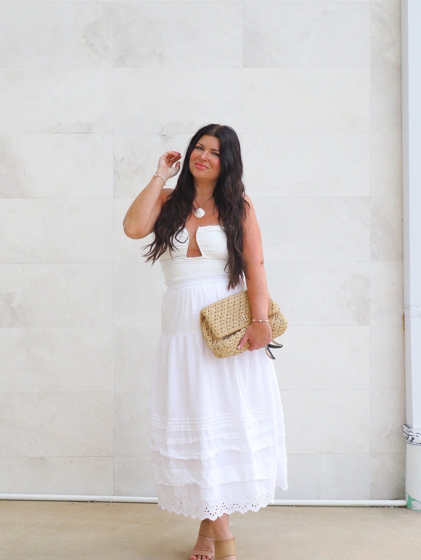 White on white summer outfit for vacation and date night  

guess what? This is two separate pieces which means you can mix and match them for endless styling options. I love this bodysuit with flowy white pants or denim. I’ve also worn this skirt with a colorful crop tank or as a swimsuit cover up.  

Sizing: Large in the top (was afraid it ran small) and M in the skirt (runs slightly large)

#LTKSummerEdit #LTKStyleTip #LTKTravel