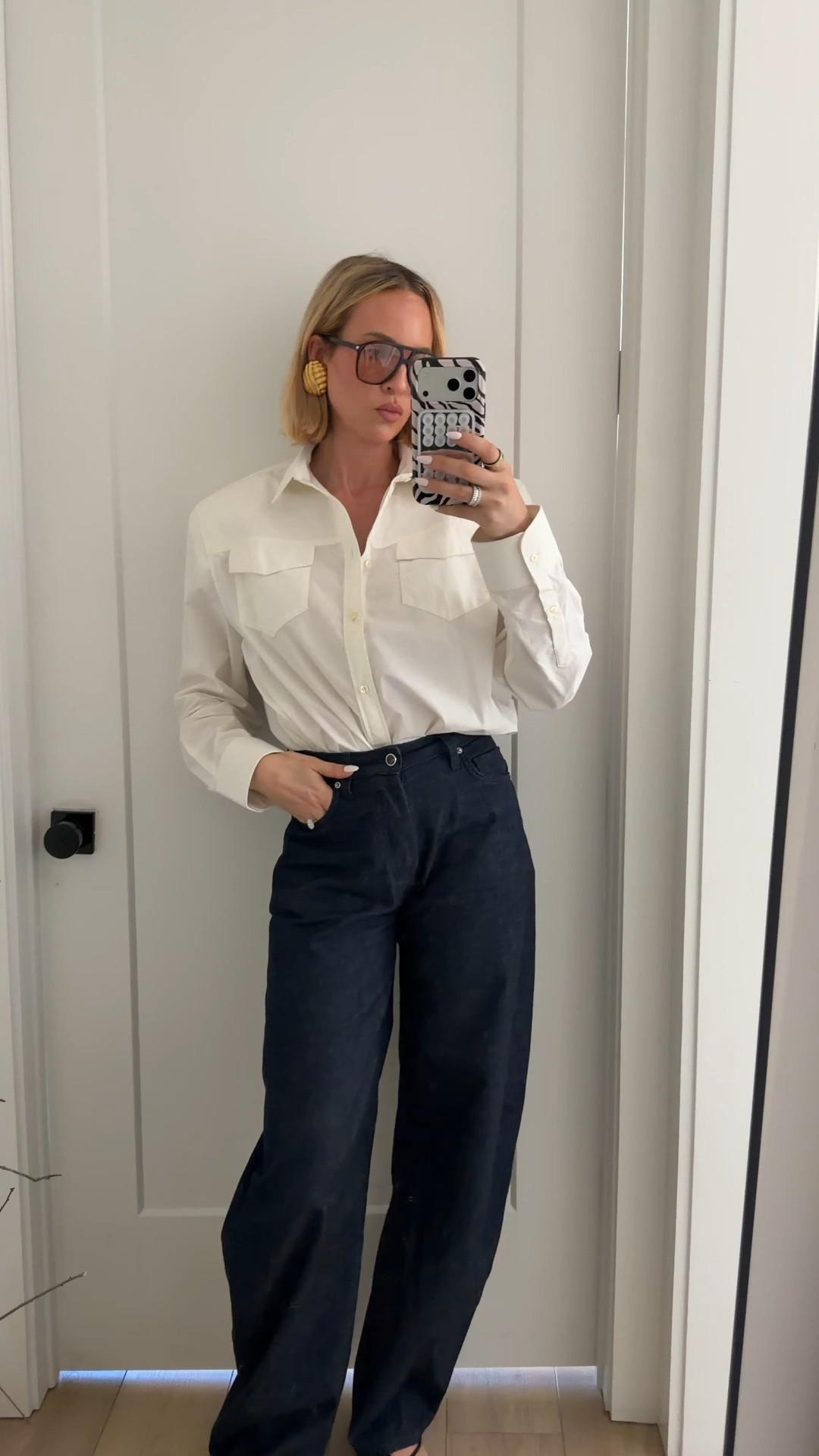 Sadly, I’m unable to link the shirt, but the one that I linked below the shoulder pads looks very similar! If you’re in between sizes, size up in the denim. Sandals run tts￼

#LTKgrwm #LTKootd #LTKmomlife