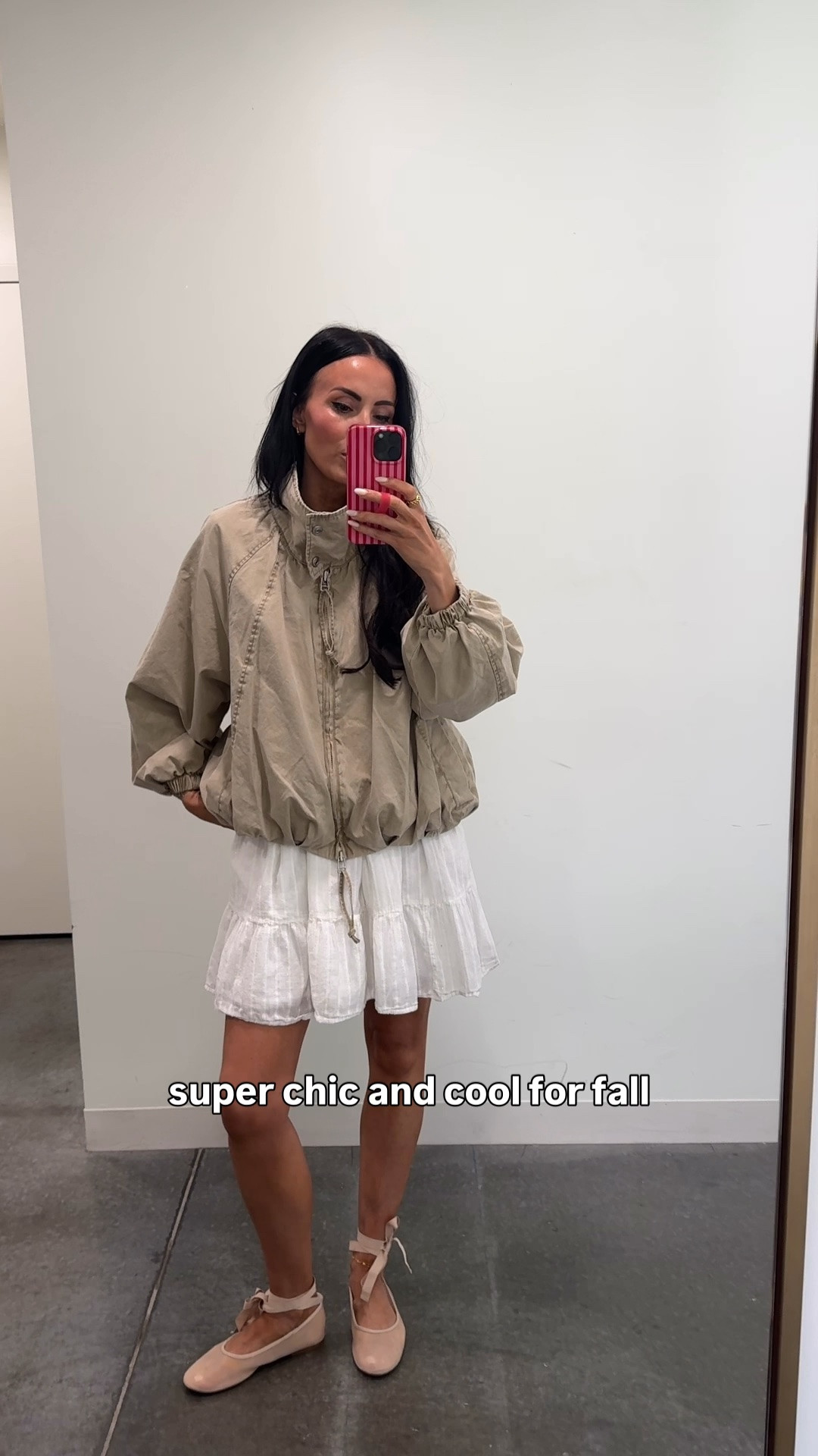 Funnel neck and balloon shaped/ thus jacket is so cool. Fit is tts. She’s classic with modern twist