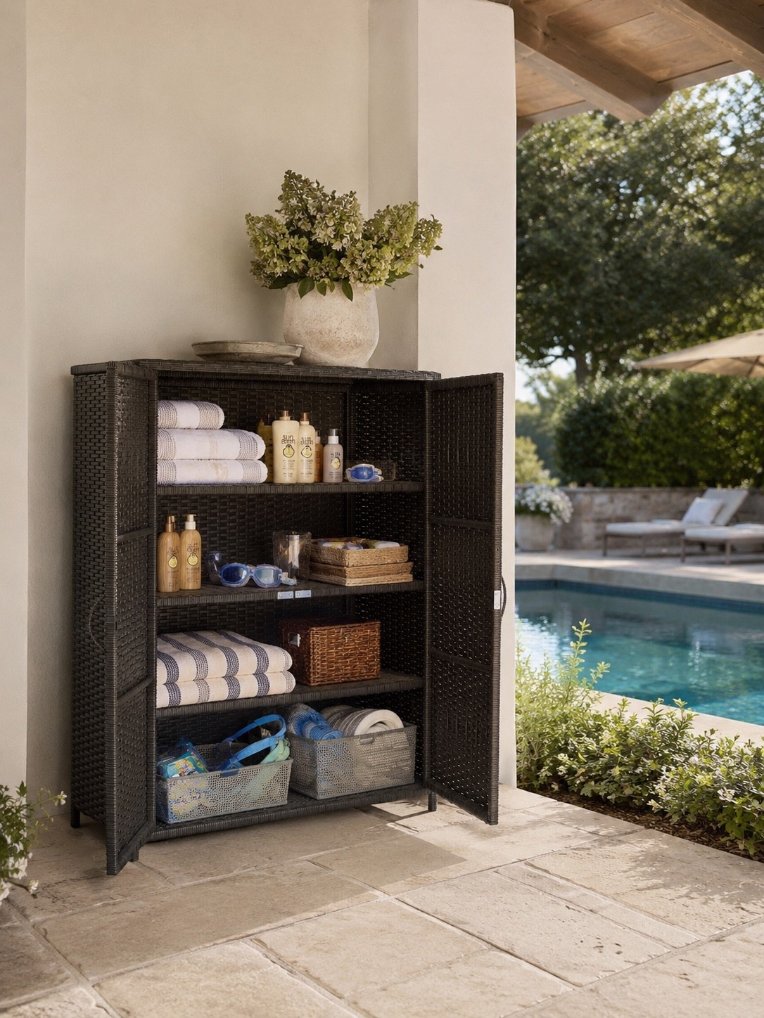 Poolside Organization, Elevated ☀️🤍

This outdoor storage cabinet is one of those pieces that makes summer entertaining feel effortless. From rolled pool towels and sunscreen to goggles, floats, and all the little essentials, everything stays organized, hidden, and ready for a day by the water. 🌿

I love how it blends seamlessly into a beautiful patio or covered porch while adding both function and style. The woven texture, warm neutral tones, and clean design make it look more like furniture than storage—exactly the kind of practical piece every backyard needs.

Follow @farmtotablecreations on Instagram for more cozy home finds and elevated outdoor inspiration 🤍

#LTKHome #OutdoorLiving #PoolsideStyle #BackyardGoals #PatioDecor #OutdoorStorage #PoolEssentials #SummerEntertaining #BackyardInspiration #OutdoorOrganization #HomeDecorFinds #CoastalStyle #OutdoorFurniture #LTKStyle #FarmhouseOutdoorLiving

#LTKHome #LTKSaleAlert