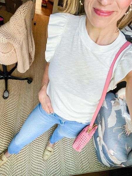 This white ruffle tank by Z Supply gets worn on REPEAT! I have an XS, and it’s so easy to wash and dry. I’ve paired it with MOTHER jean sin a 25 (TTS) and a Clare V Crossbody bag. These shoes are Sam Edelman Rattan Loafers. #springstyle 

#LTKstyletip #LTKSeasonal #LTKunder100