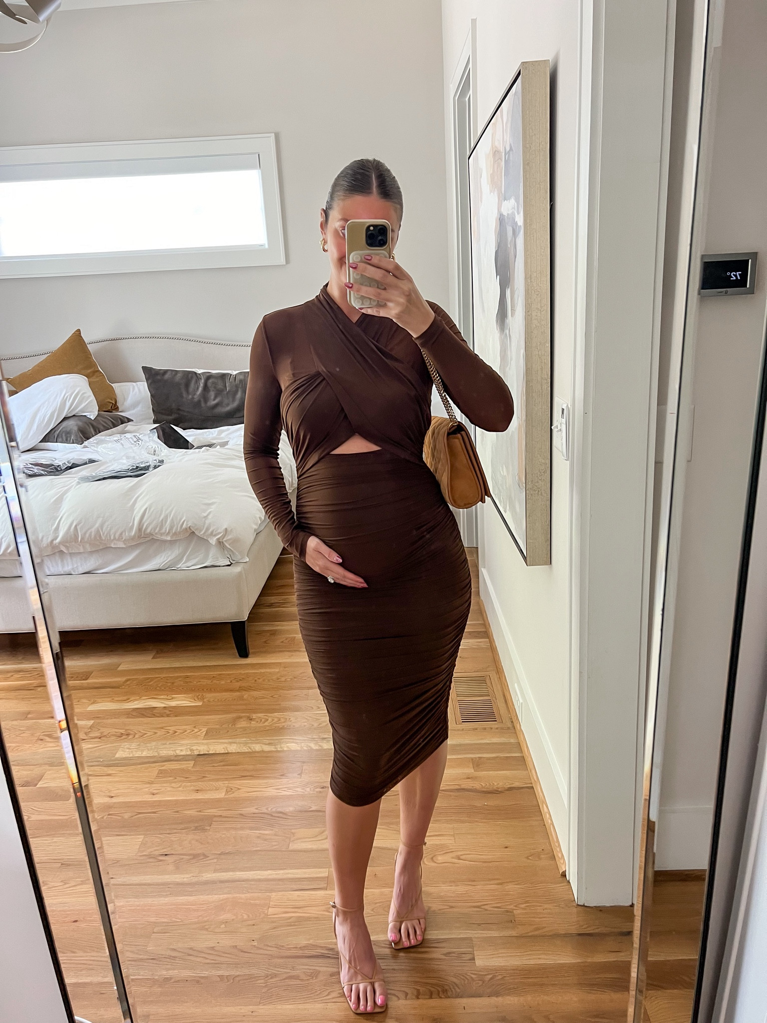 Fall wedding guest dress! I love this chocolate brown dress for a wedding. I sized up to a medium to fit the bump - perfect for the in between temperatures right now. Runs true to size. 

#LTKWedding #LTKBump #LTKStyleTip