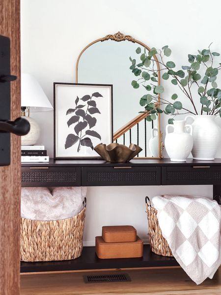 Spring entryway, entryway table, entryway decor, gold arched mirror, black console table, spring stems, shagreen boxes 

#LTKhome #LTKfindsunder50