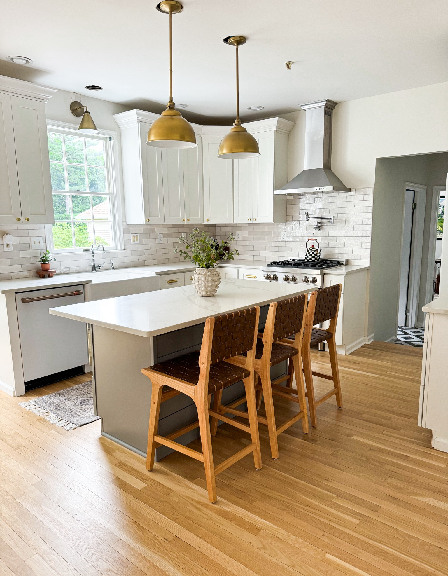 Kitchen remodel 
Cafe appliances 
Zline appliances 
White cabinets 
Backsplash from floor and decor 