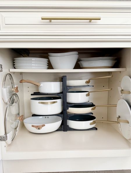 Ok so this pot and pan organizational rack is a total game changer!! It truly helps keep all my cookware easy to reach and organized when I need it! No more stacking heavy cookware on top of each other!! Also, how amazing are my adhesive lid holders!! Just peel, stick and insert any size lid for easy organization. I’m usually the silky one who can’t ever find the right lids to my pots and now I can finally find them in one place! To say I’m obsessed with the Amazon finds is an understatement!! 

Ceramic cookware 
Amazon pot and pan organization rack
Amazon peel and stick lid organization  
Amazon home 
Amazon kitchen must haves 
Amazon Home 
Amazon finds 
Kitchen cookware 
Budget friendly kitchen organization 
Cabinet organization 

#LTKSpringSale #LTKhome #LTKVideo