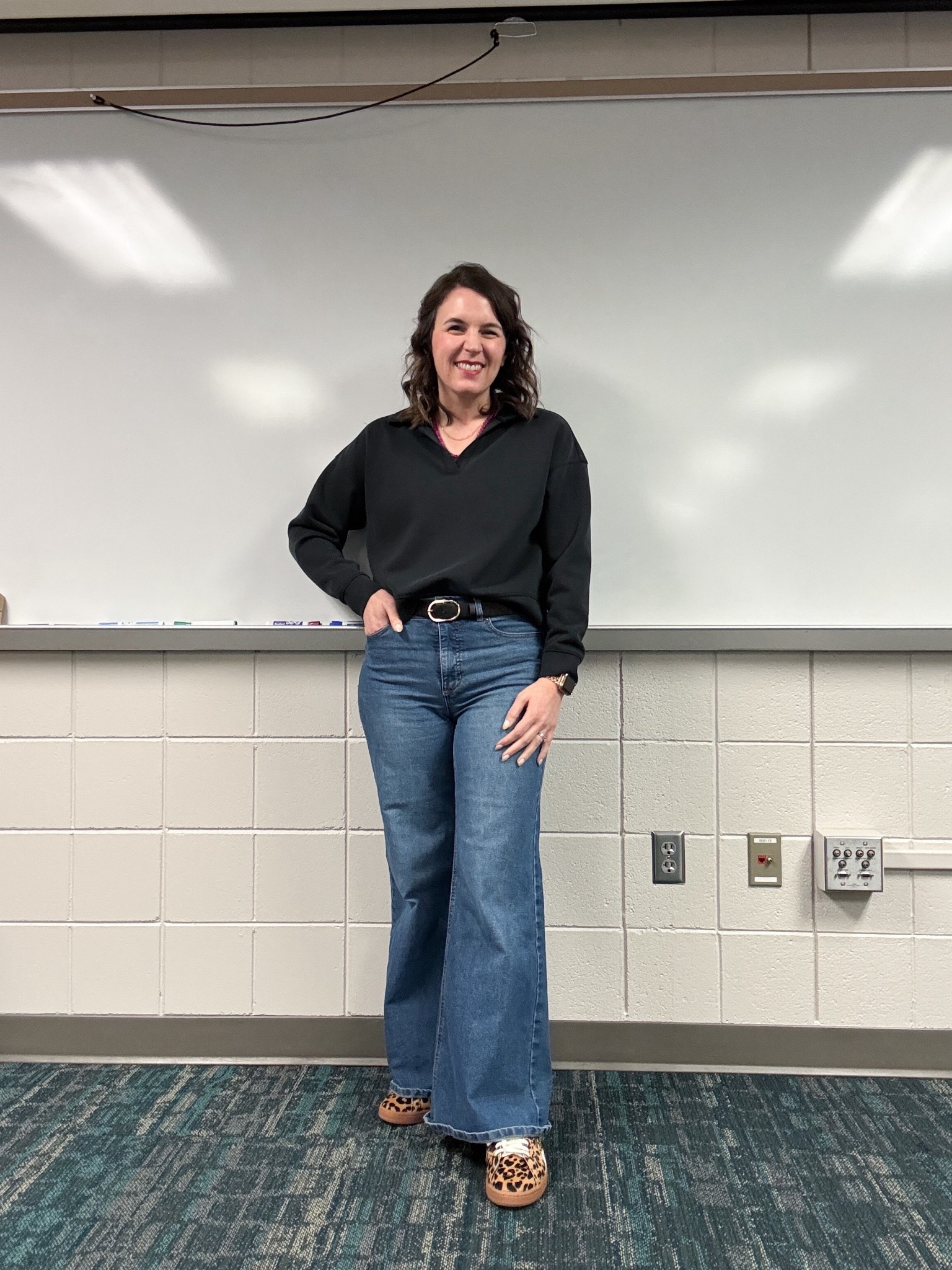 My face shows how excited I am about these new leopard sneakers. I just love fun sneakers in general. They make a basic outfit more fun!

Size wise, they didn’t have my usual size 10 in stock. I went with a 9.5 and they were good all day at school  