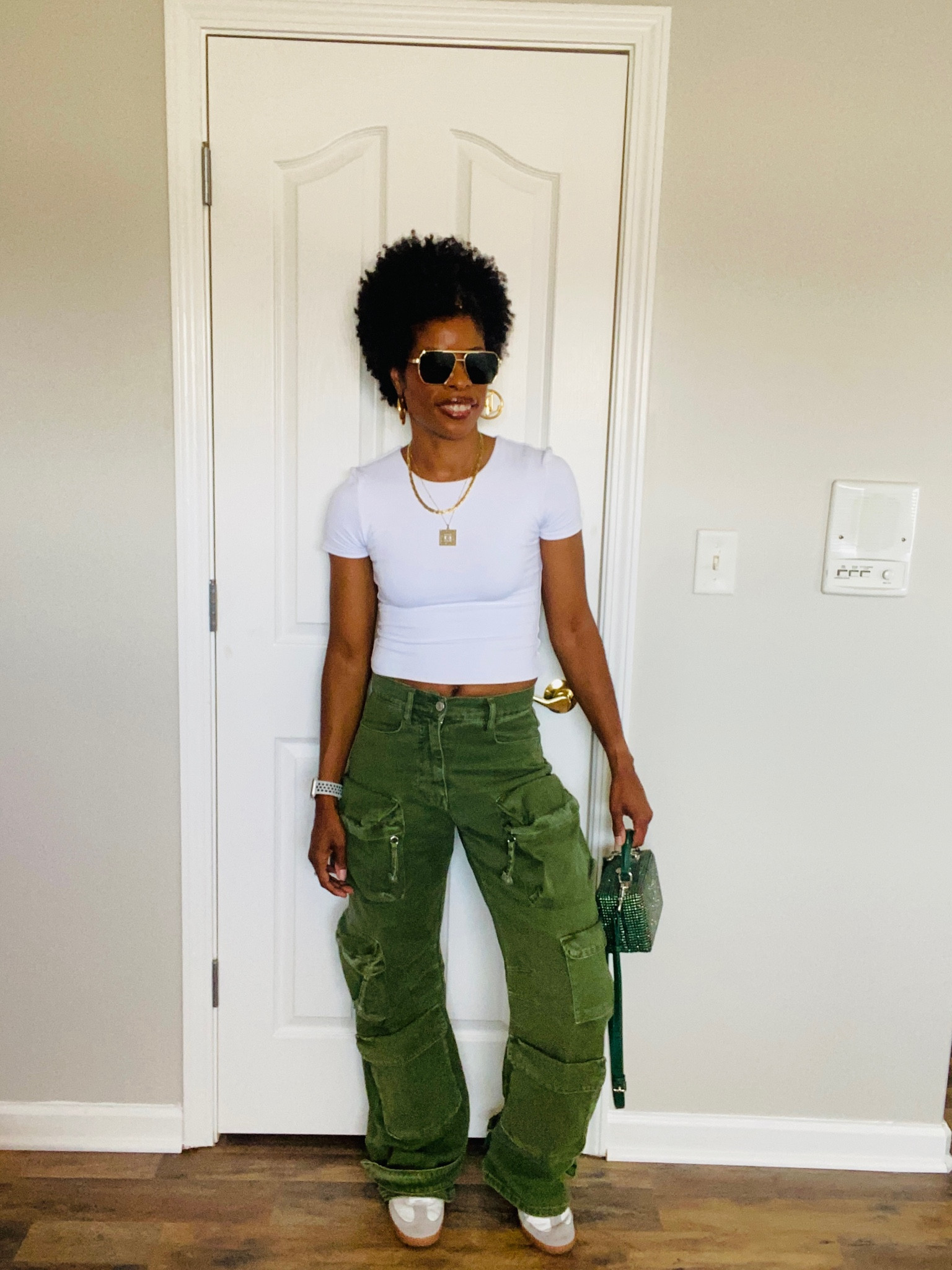 Crop top and cargo jeans for the look! 

#LTKSeasonal #LTKitbag #LTKshoecrush