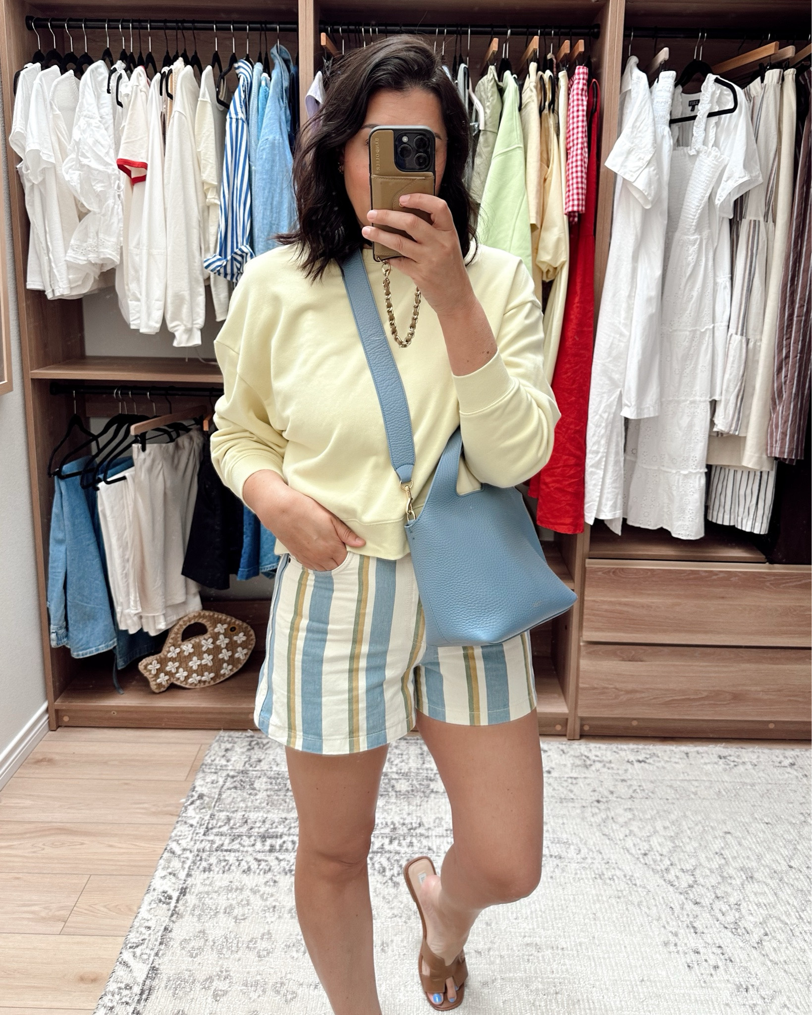 I’m in the 10 of the sezane shorts! I’m in the large of the sweatshirt.