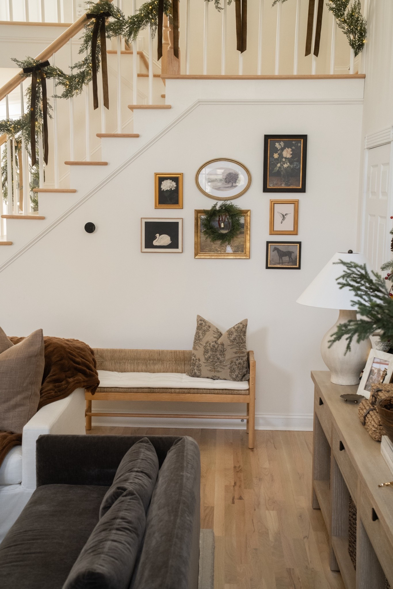 A great way to fill an empty space below the stairs! Love this gallery wall and affordable bench



#LTKHome