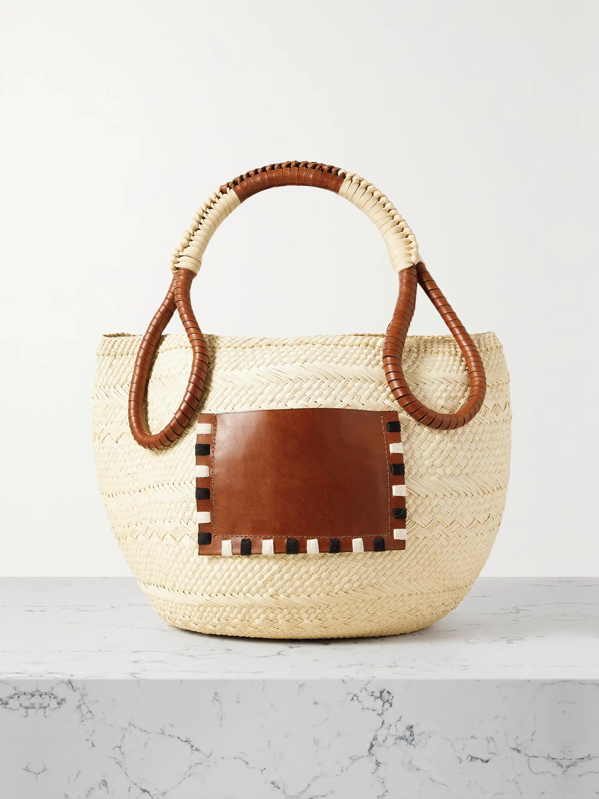 Johanna Ortiz's 'Singing The Namba' tote has a distinctive egg shape that's as practical as it is... | NET-A-PORTER (UK & EU)
