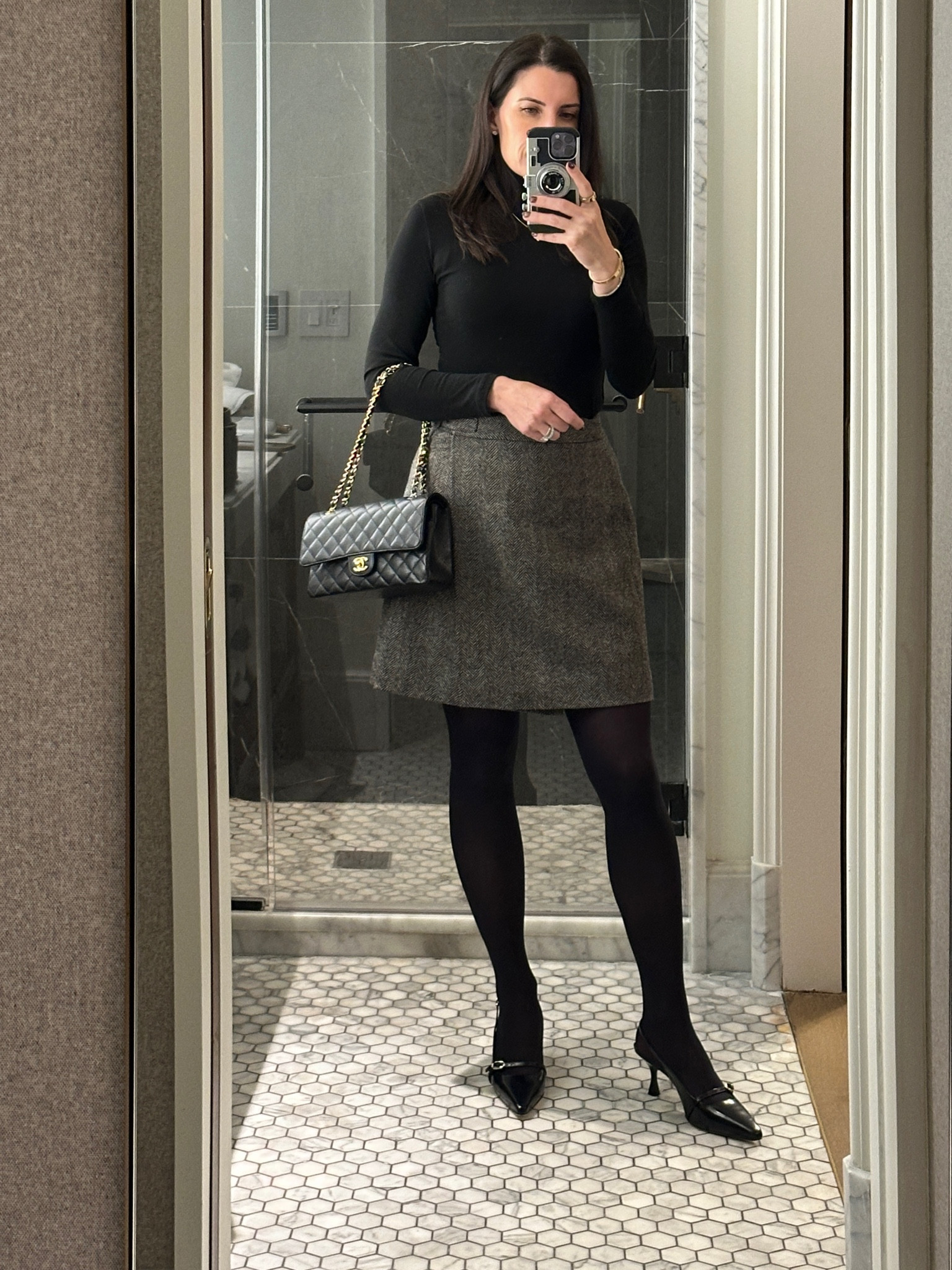Tweed pleated wrap skirt and black turtleneck 

#LTKMidsize #LTKStyleTip #LTKOver40